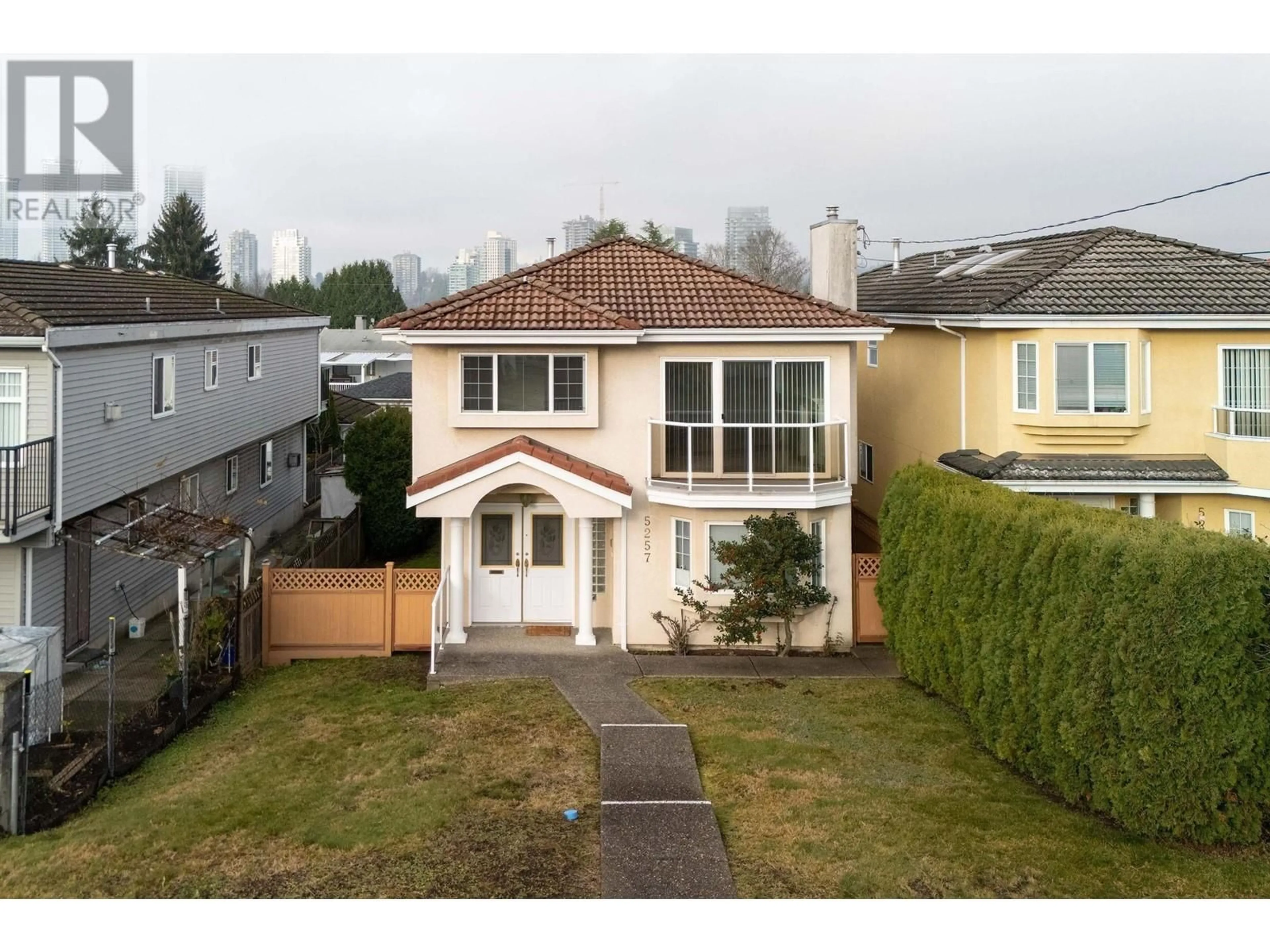 Frontside or backside of a home, the fenced backyard for 5257 NORFOLK STREET, Burnaby British Columbia V5G1G3