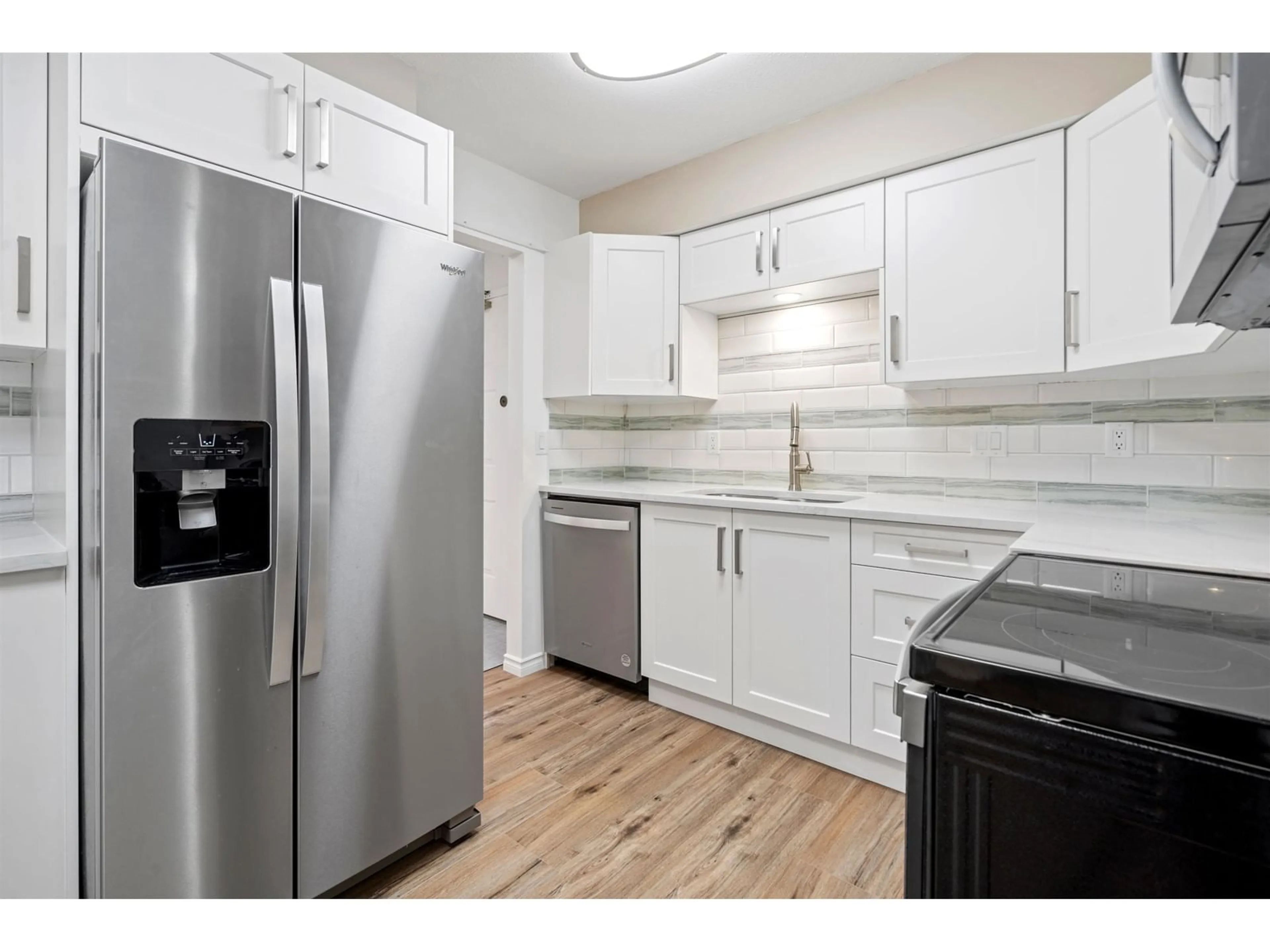 Standard kitchen, wood floors for 309 2425 CHURCH STREET, Abbotsford British Columbia V2T3J8