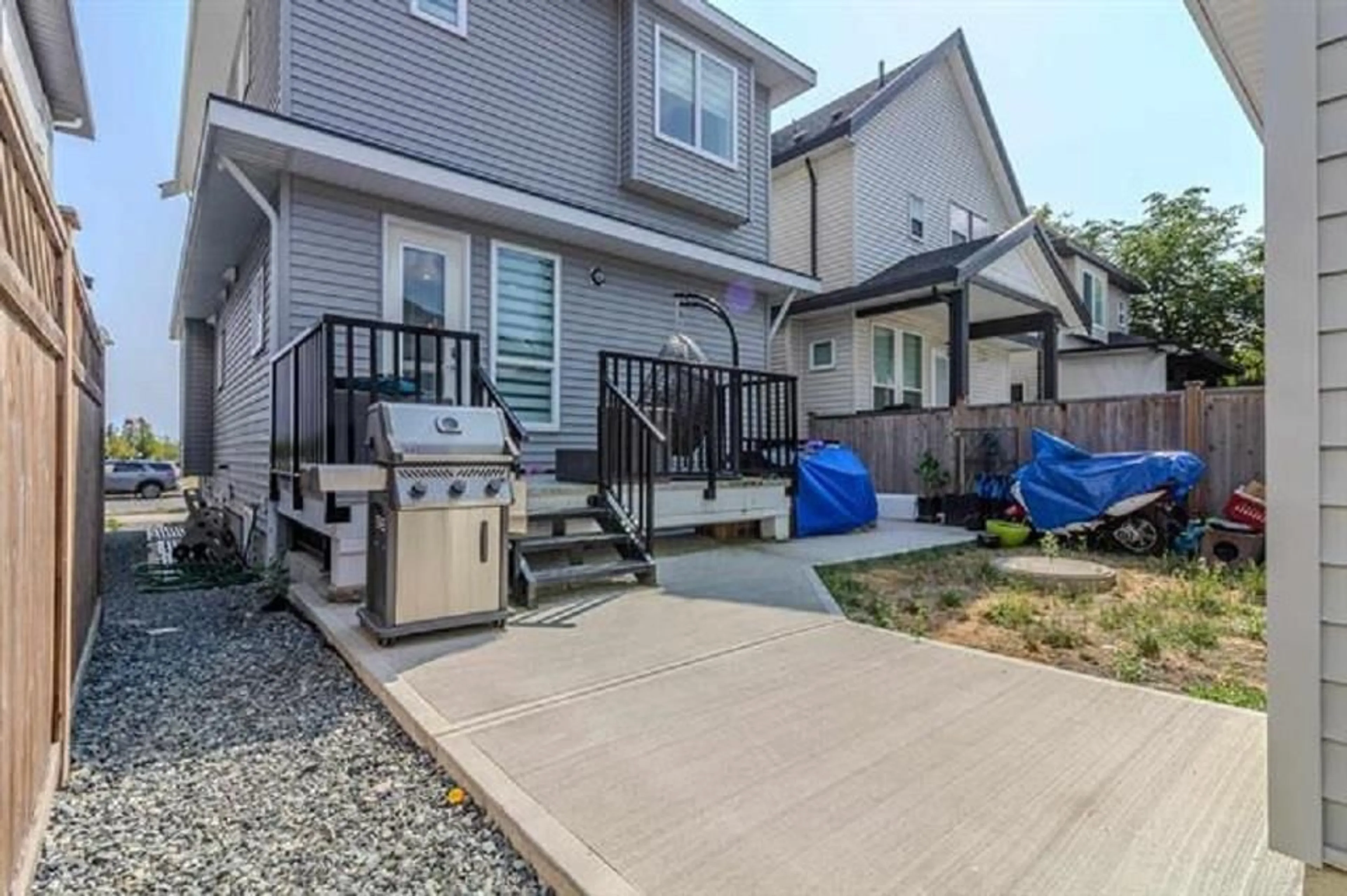 Frontside or backside of a home, the fenced backyard for 19415 70 AVENUE, Surrey British Columbia V4N1N2