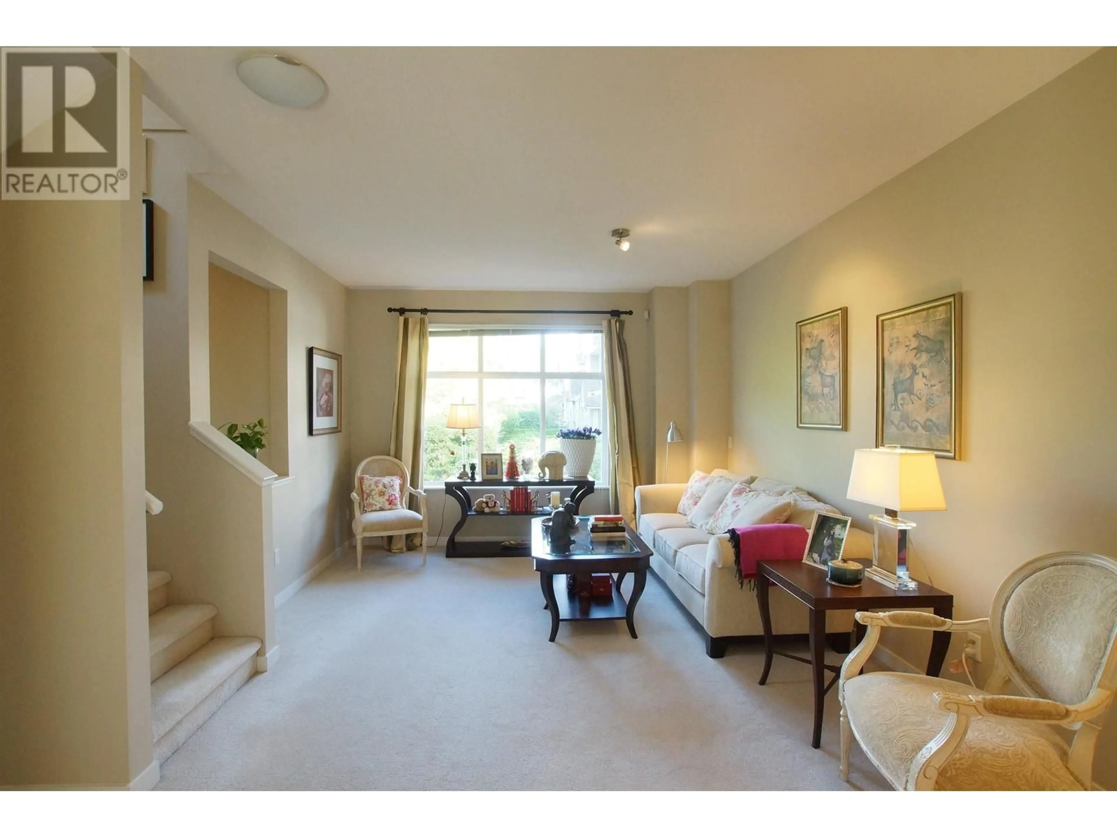 Living room with furniture, carpet floor for 42 - 9800 ODLIN ROAD, Richmond British Columbia V6X0C2