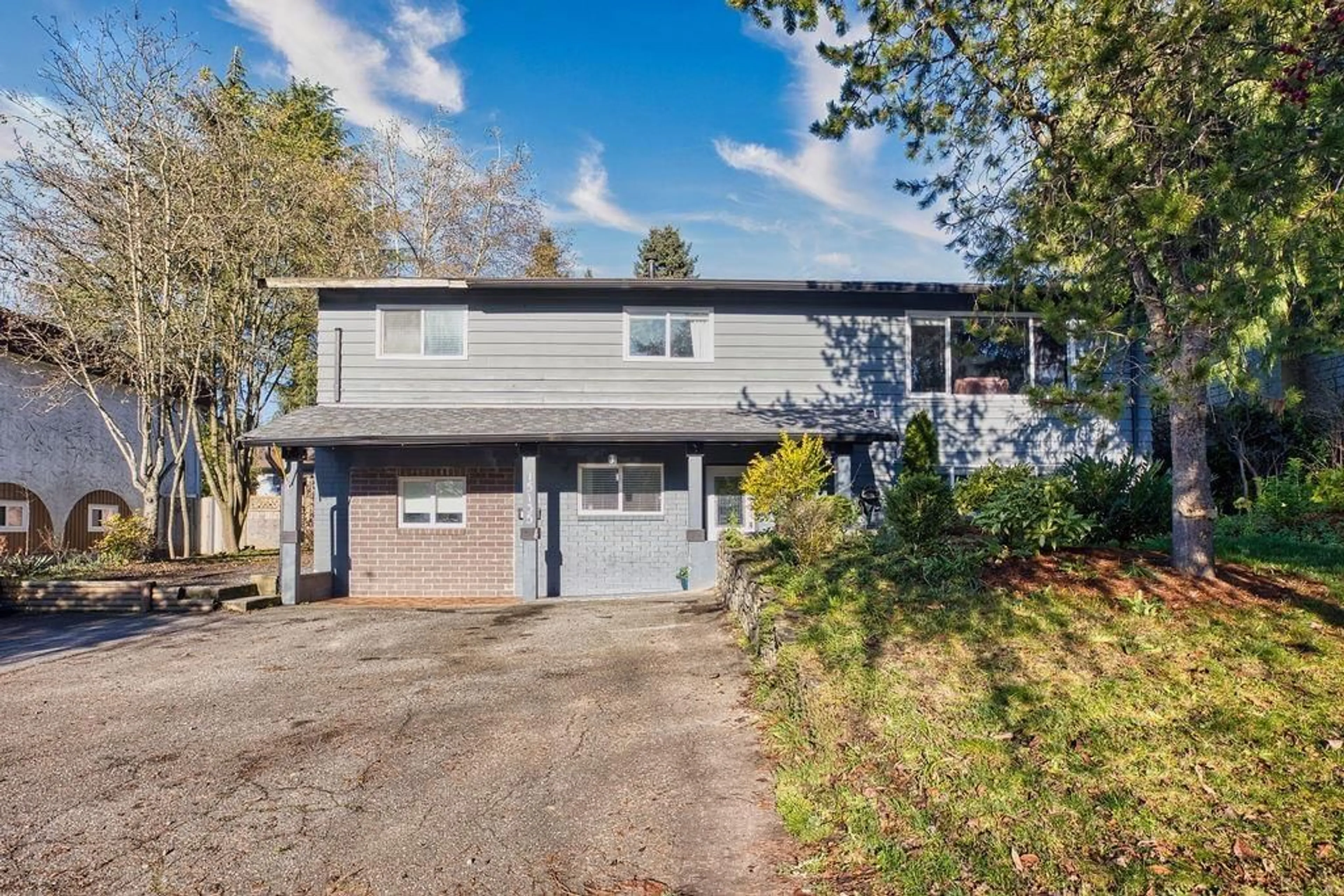 Home with vinyl exterior material, street for 15135 86 AVENUE, Surrey British Columbia V3S4T8