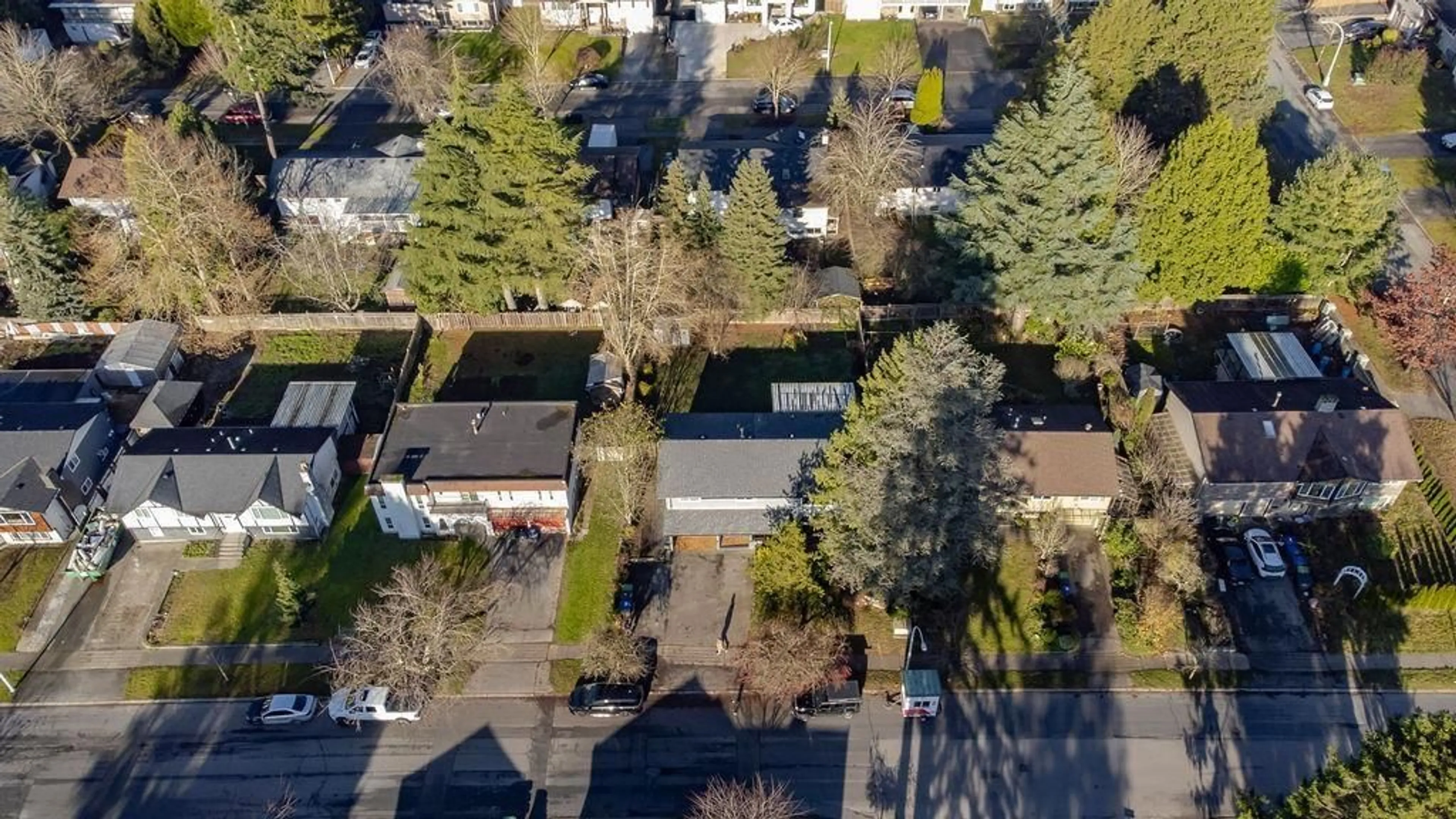 A pic from outside/outdoor area/front of a property/back of a property/a pic from drone, street for 15135 86 AVENUE, Surrey British Columbia V3S4T8