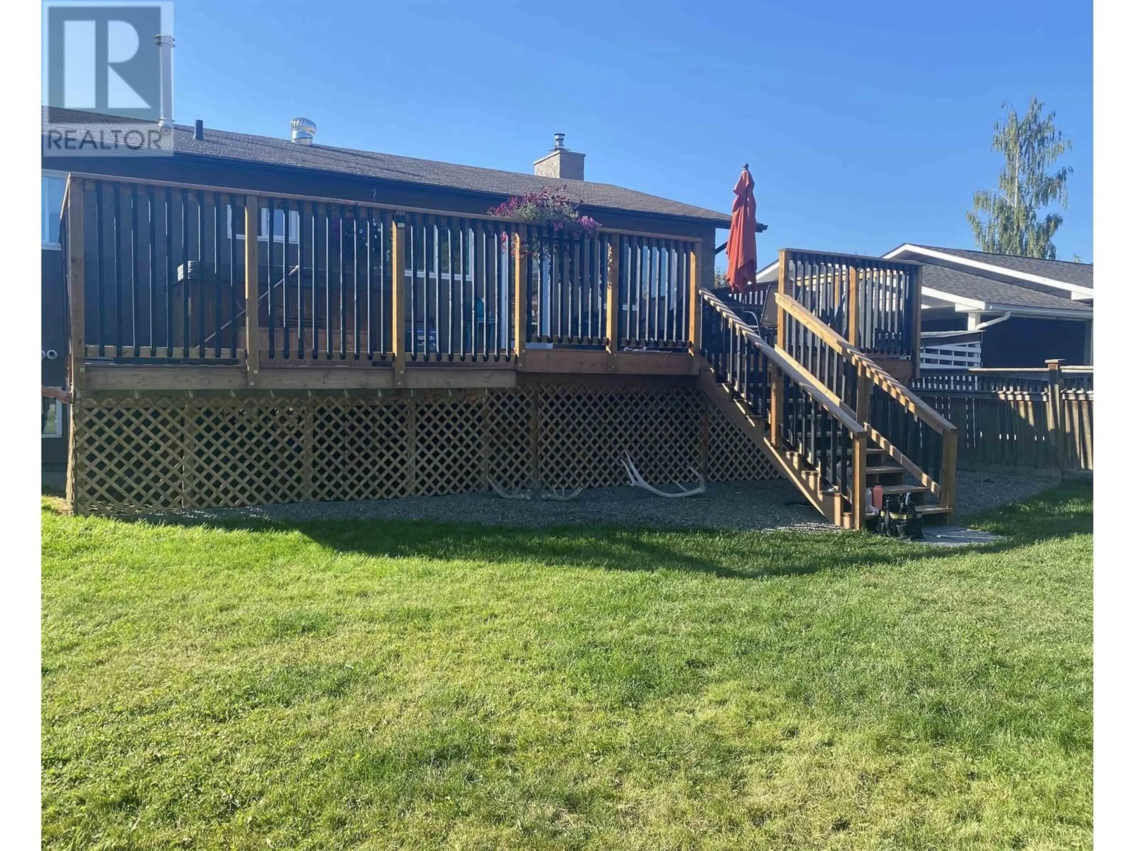 Frontside or backside of a home, the fenced backyard for 333 VANDERVIEW DRIVE, Vanderhoof British Columbia V0J3A2