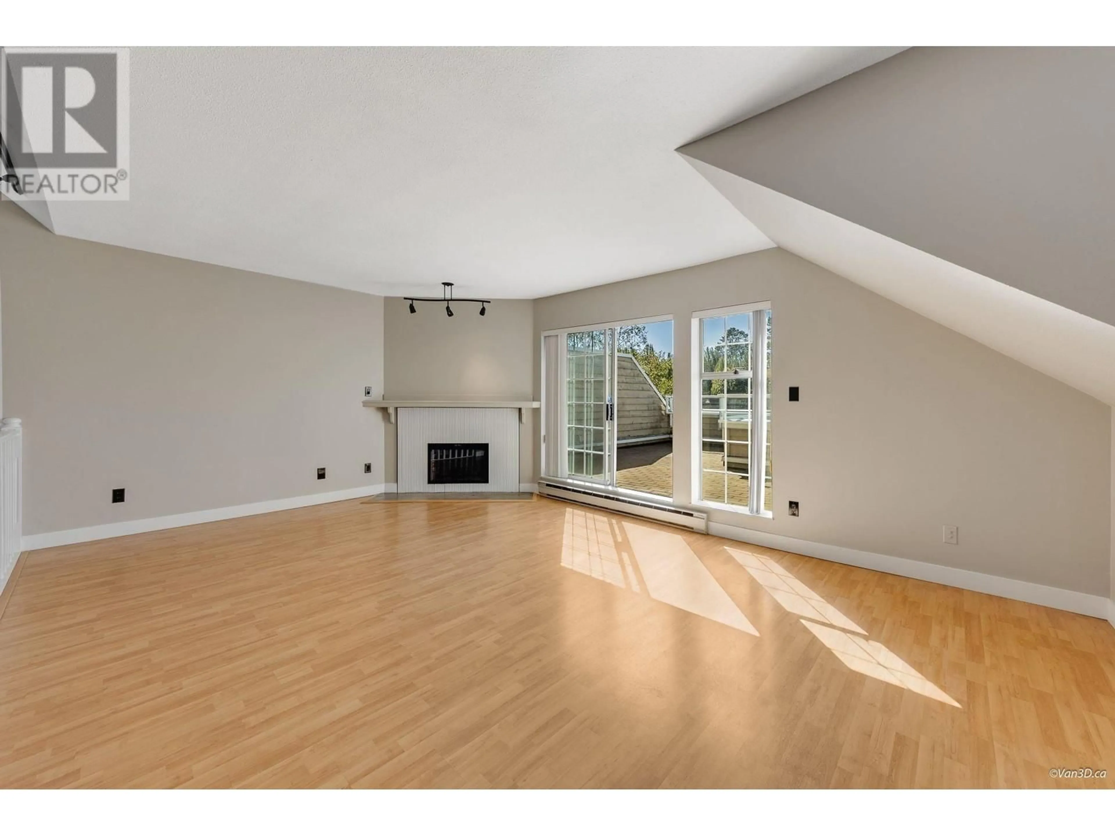 A pic of a room, wood floors for 401 3421 CURLE AVENUE, Burnaby British Columbia V5G4P4