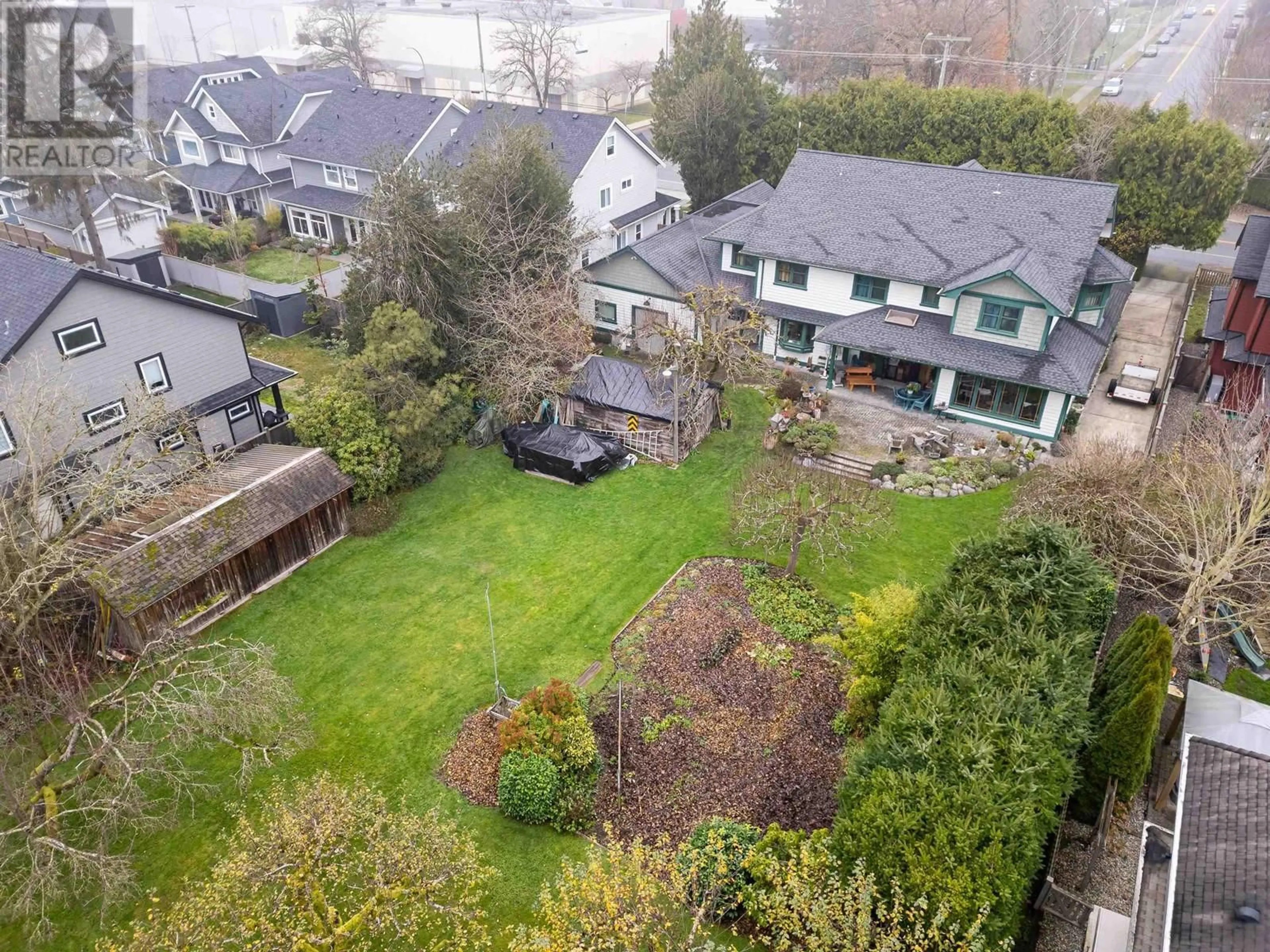 Frontside or backside of a home, the fenced backyard for 5080 45TH AVE AVENUE, Delta British Columbia V4K1K3