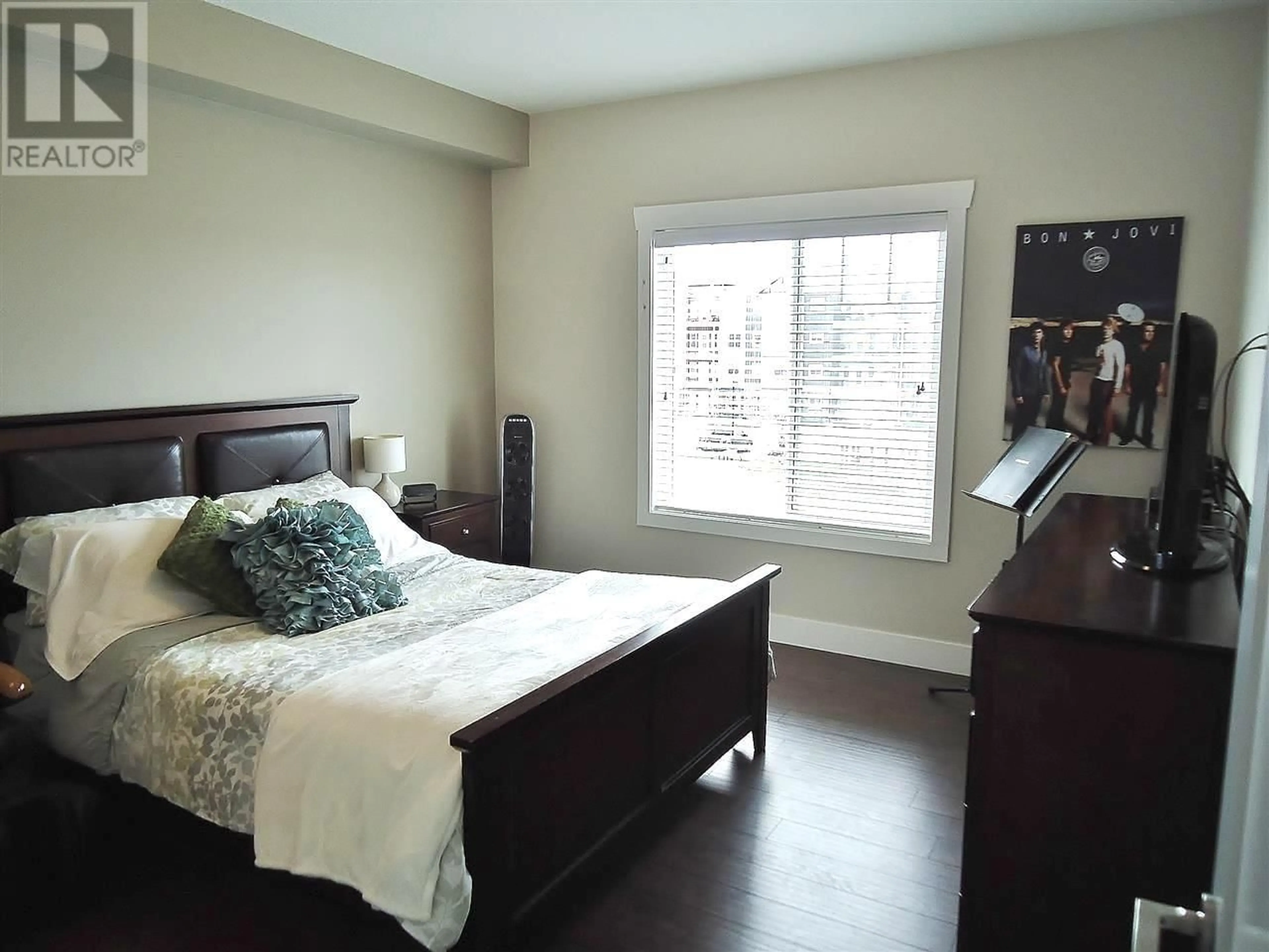 A pic of a room, wood floors for 303 11203 105 AVENUE, Fort St. John British Columbia V1J0L3