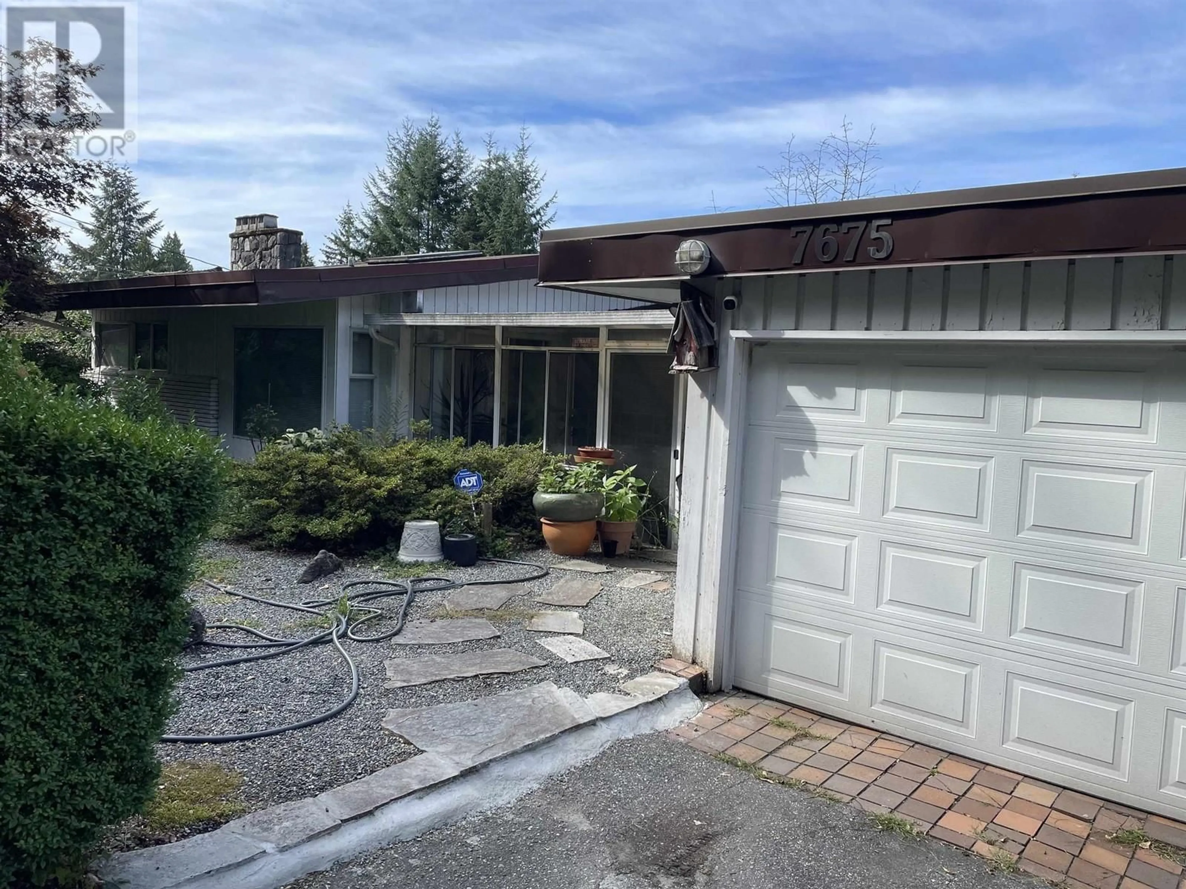 Frontside or backside of a home, cottage for 7675 HASZARD STREET, Burnaby British Columbia V5E1Y1