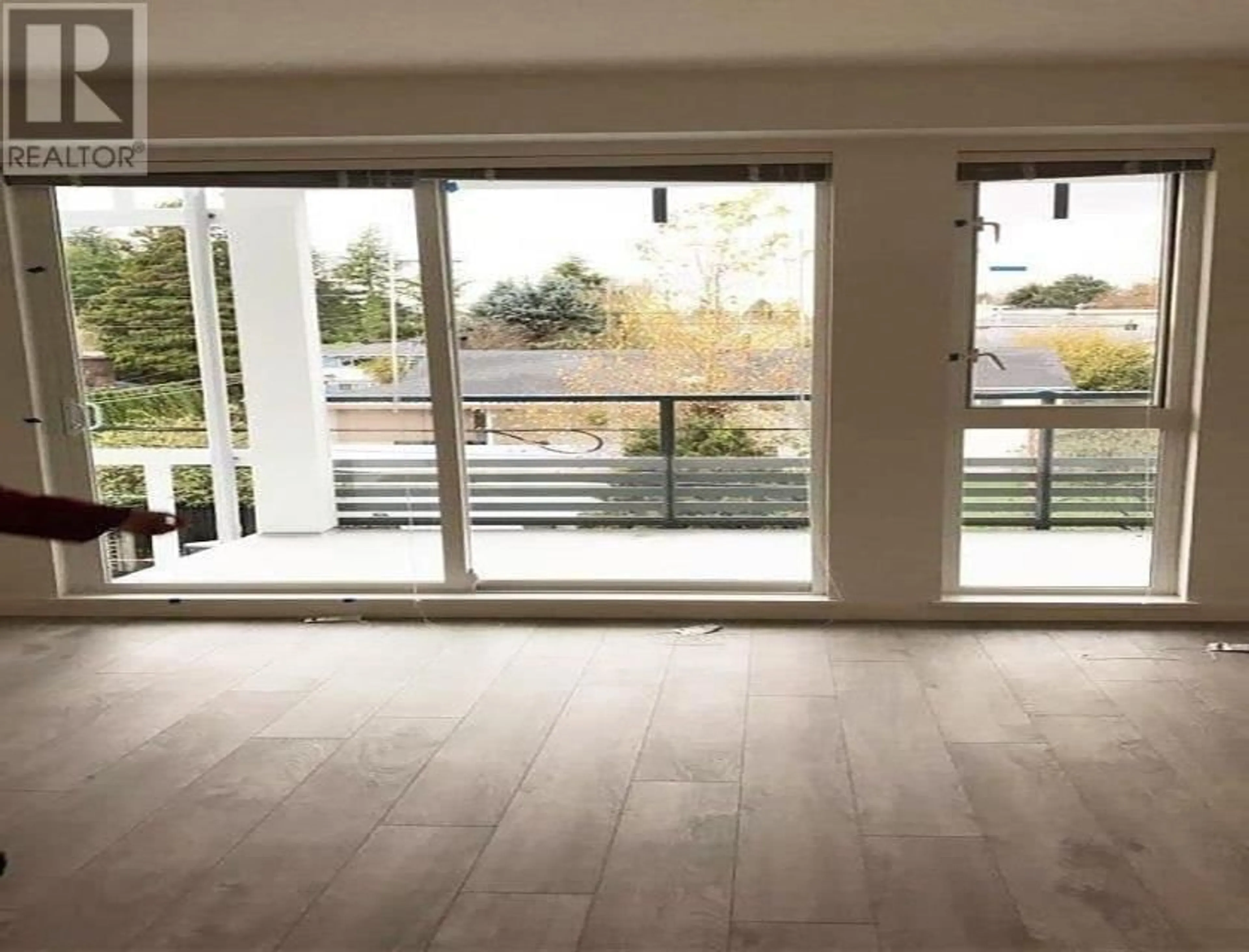 A pic of a room, wood floors for 307 6633 CAMBIE STREET, Vancouver British Columbia V6P0E5