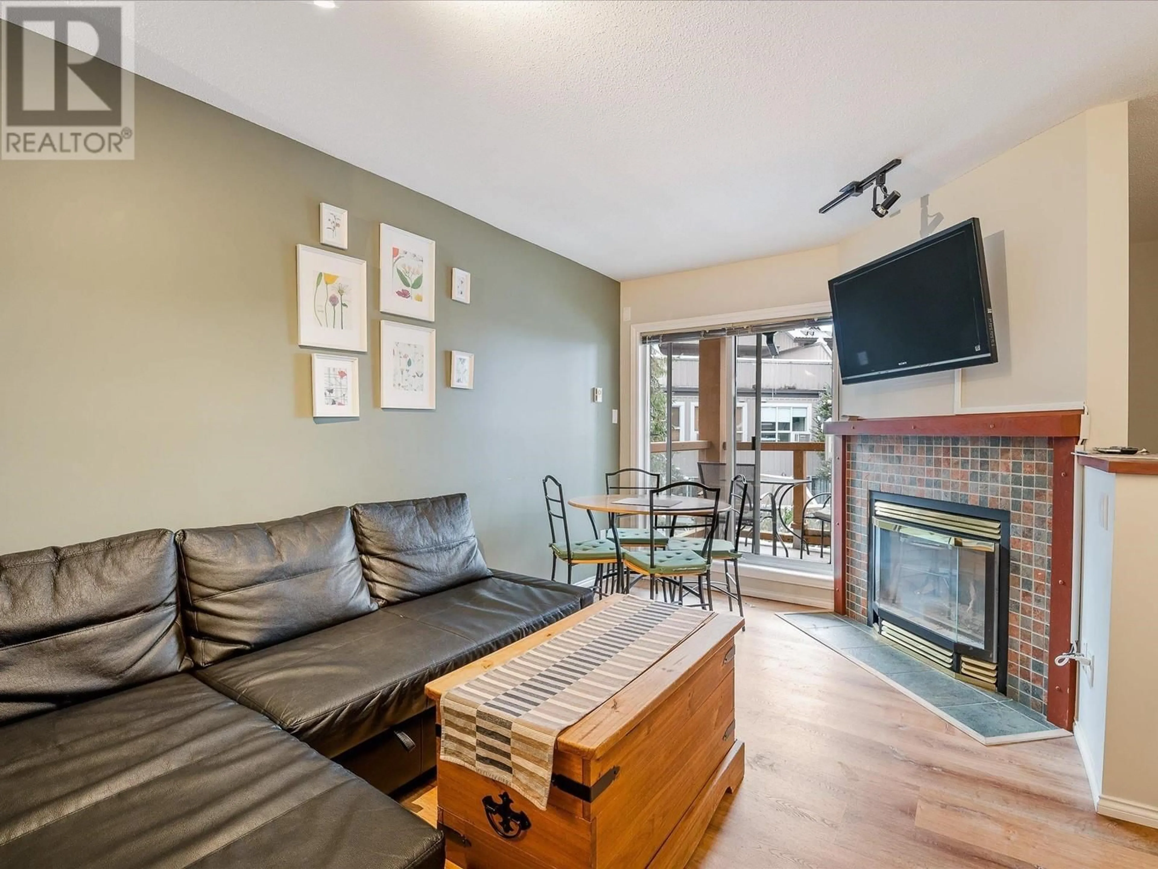 Living room, wood floors for 102 4388 NORTHLANDS BOULEVARD, Whistler British Columbia V0N1B4