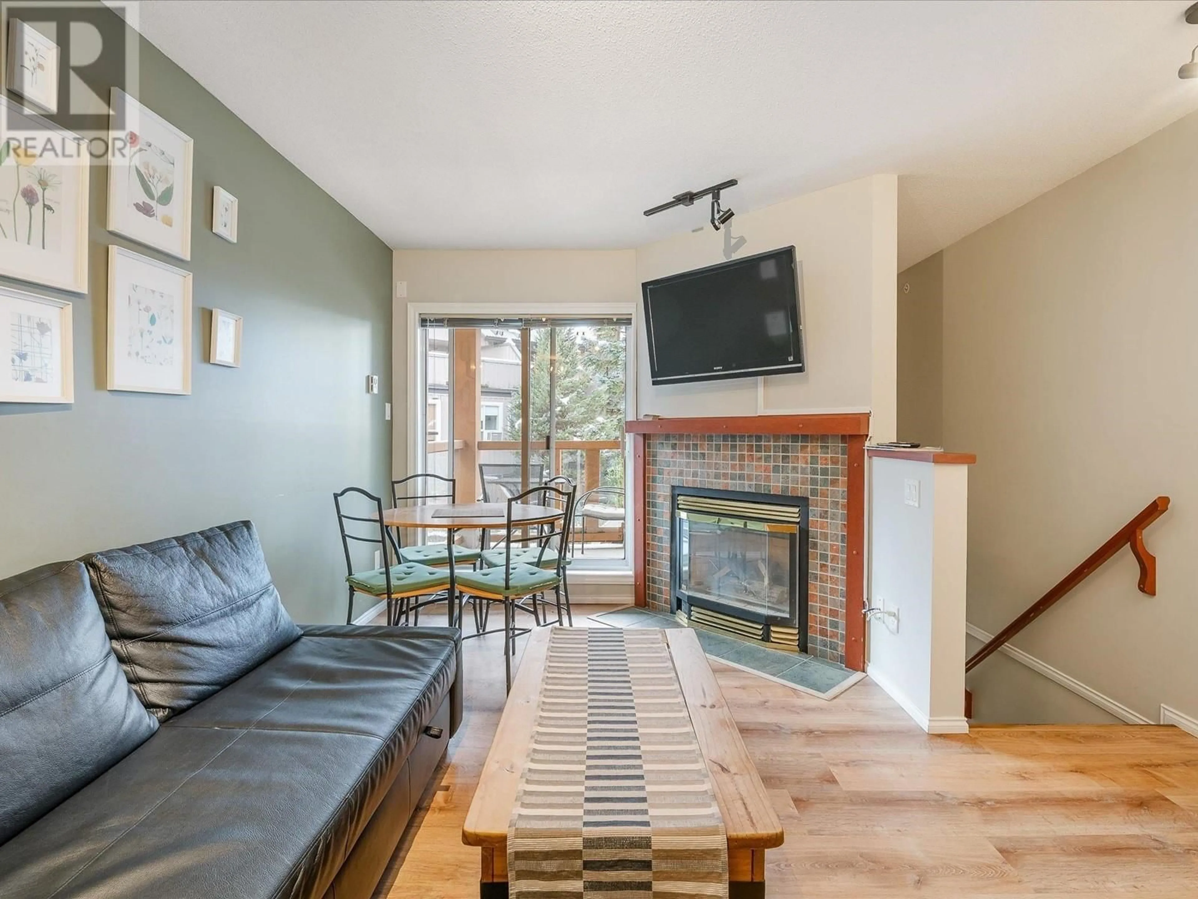 Living room, wood floors for 102 4388 NORTHLANDS BOULEVARD, Whistler British Columbia V0N1B4