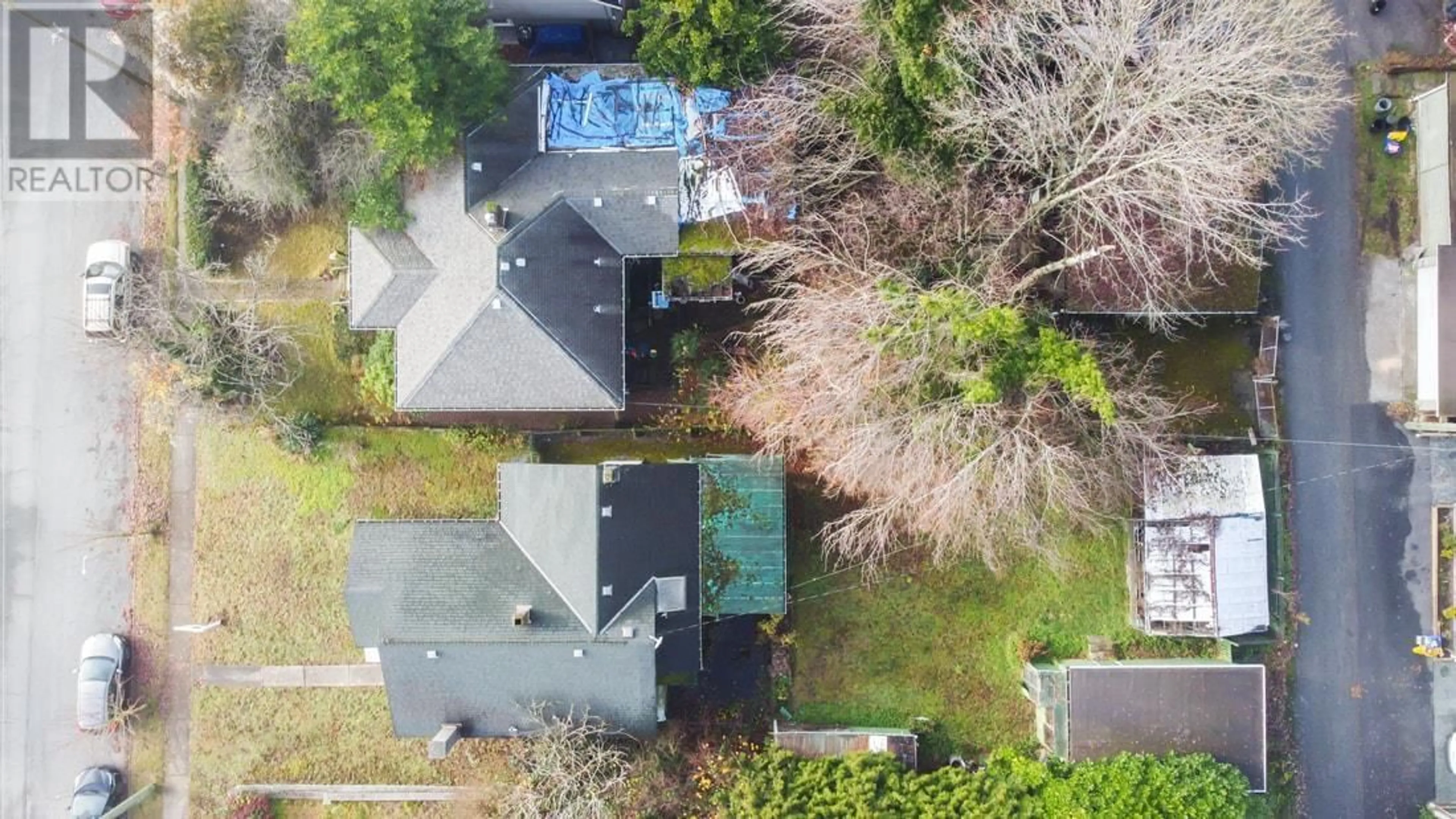 Frontside or backside of a home, the fenced backyard for 438 W 14TH STREET, North Vancouver British Columbia V7P1Y6