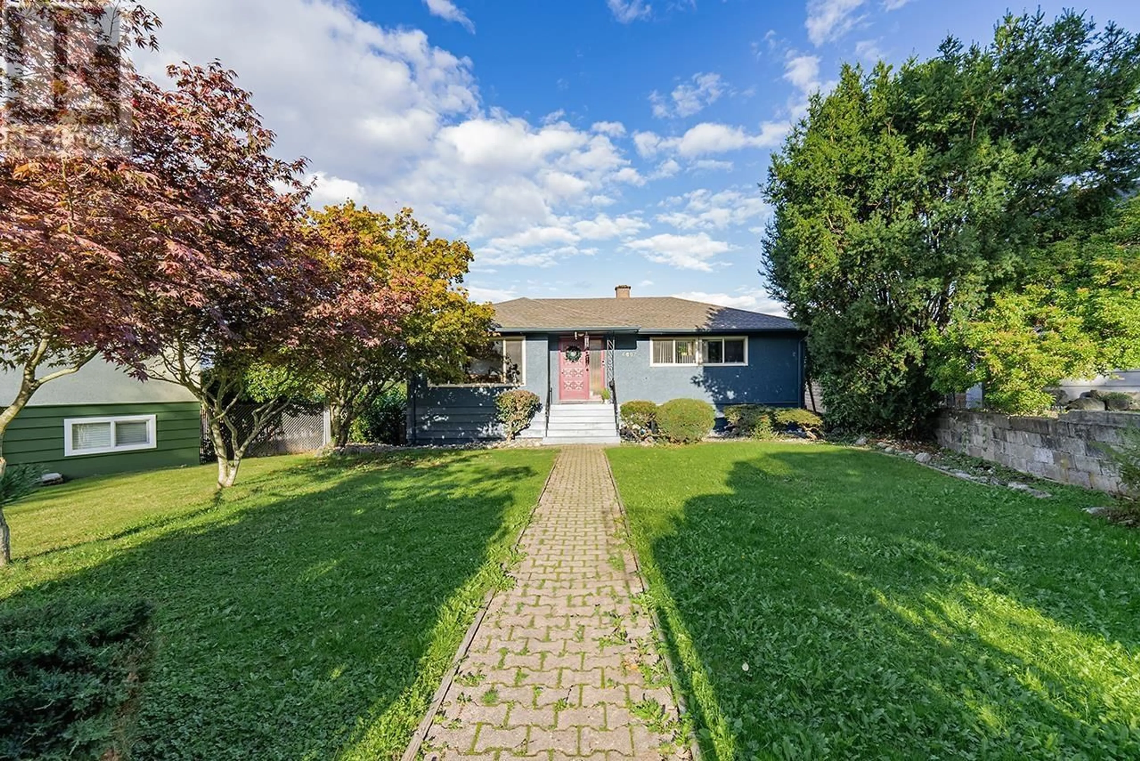 Frontside or backside of a home, the fenced backyard for 4667 CHARLOTTE COURT, Burnaby British Columbia V5G2V1