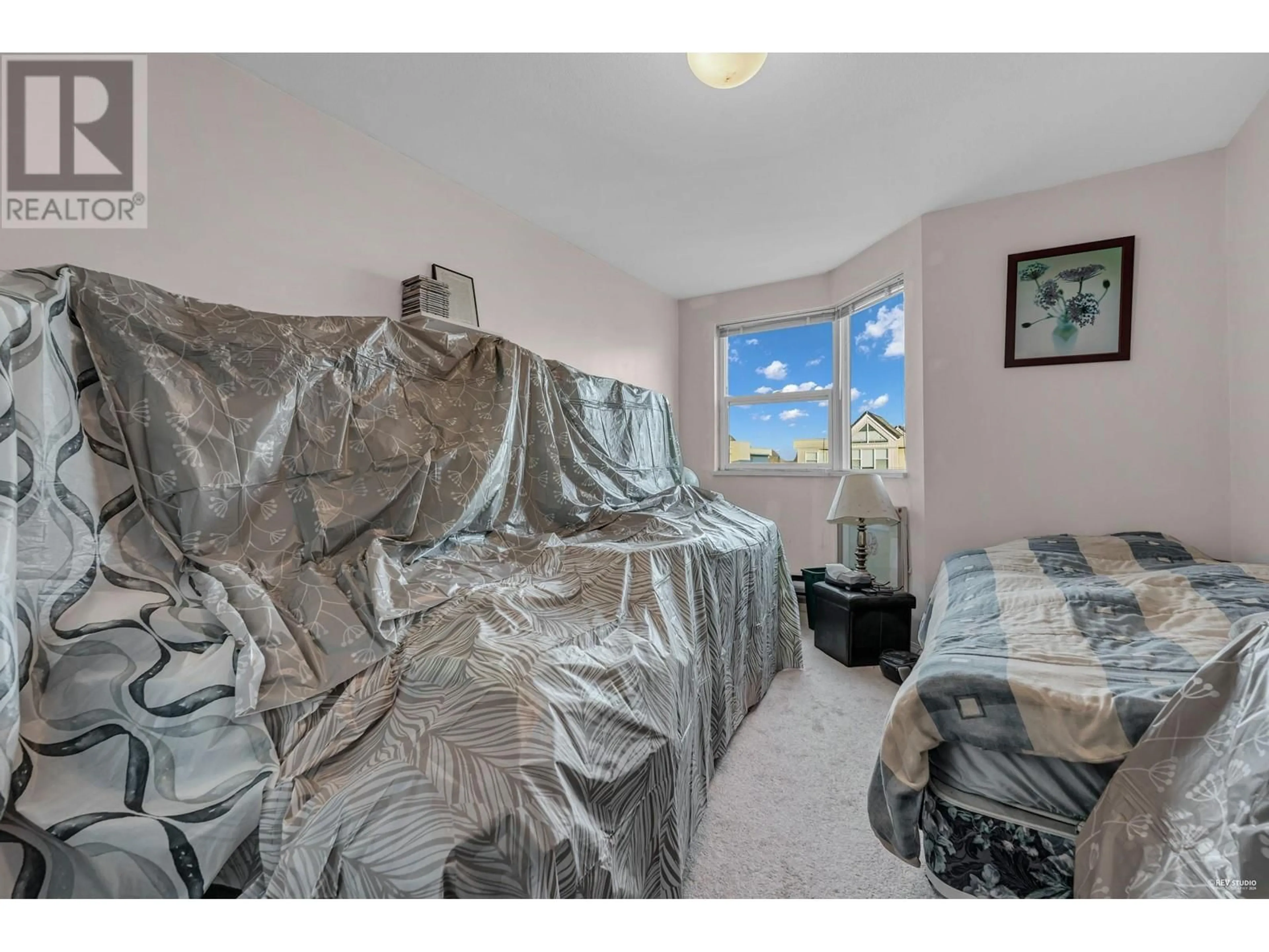 A pic of a room, not visible floor for 401 7011 BLUNDELL ROAD, Richmond British Columbia V6Y1J5