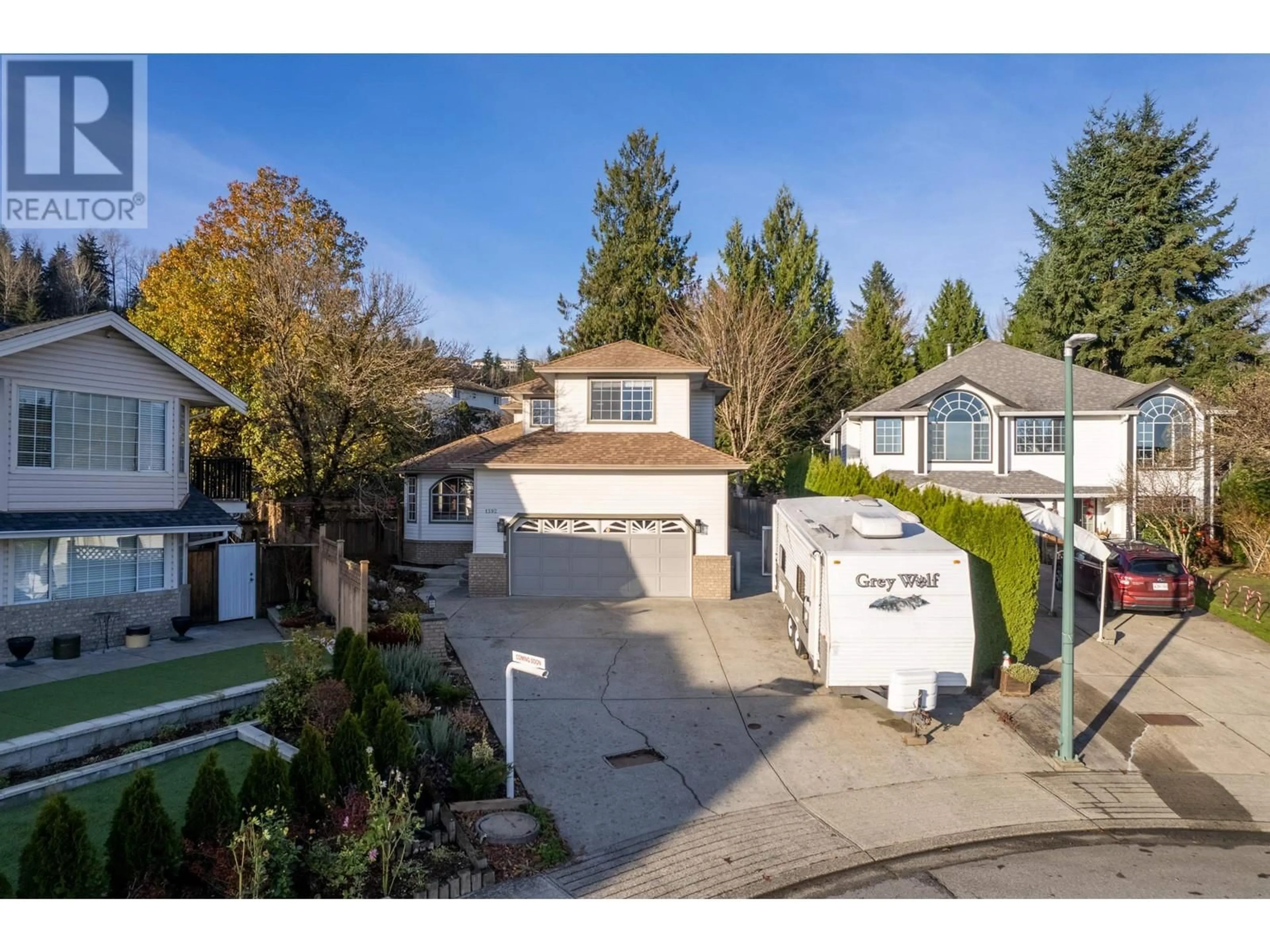 Frontside or backside of a home, the fenced backyard for 1392 EL CAMINO DRIVE, Coquitlam British Columbia V3E2W6