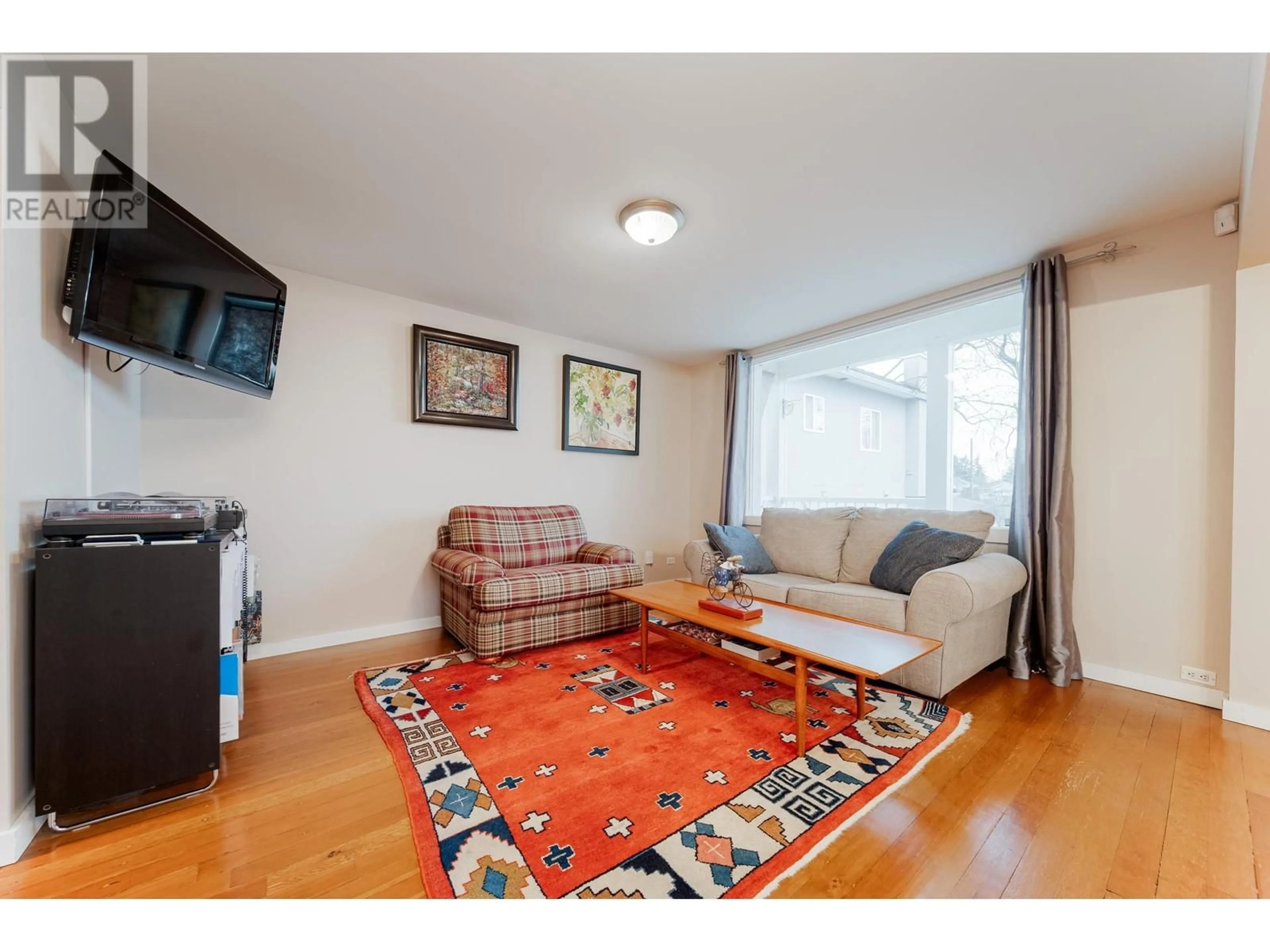 Living room, wood floors for 1865 E 53RD AVENUE, Vancouver British Columbia V5P1X5