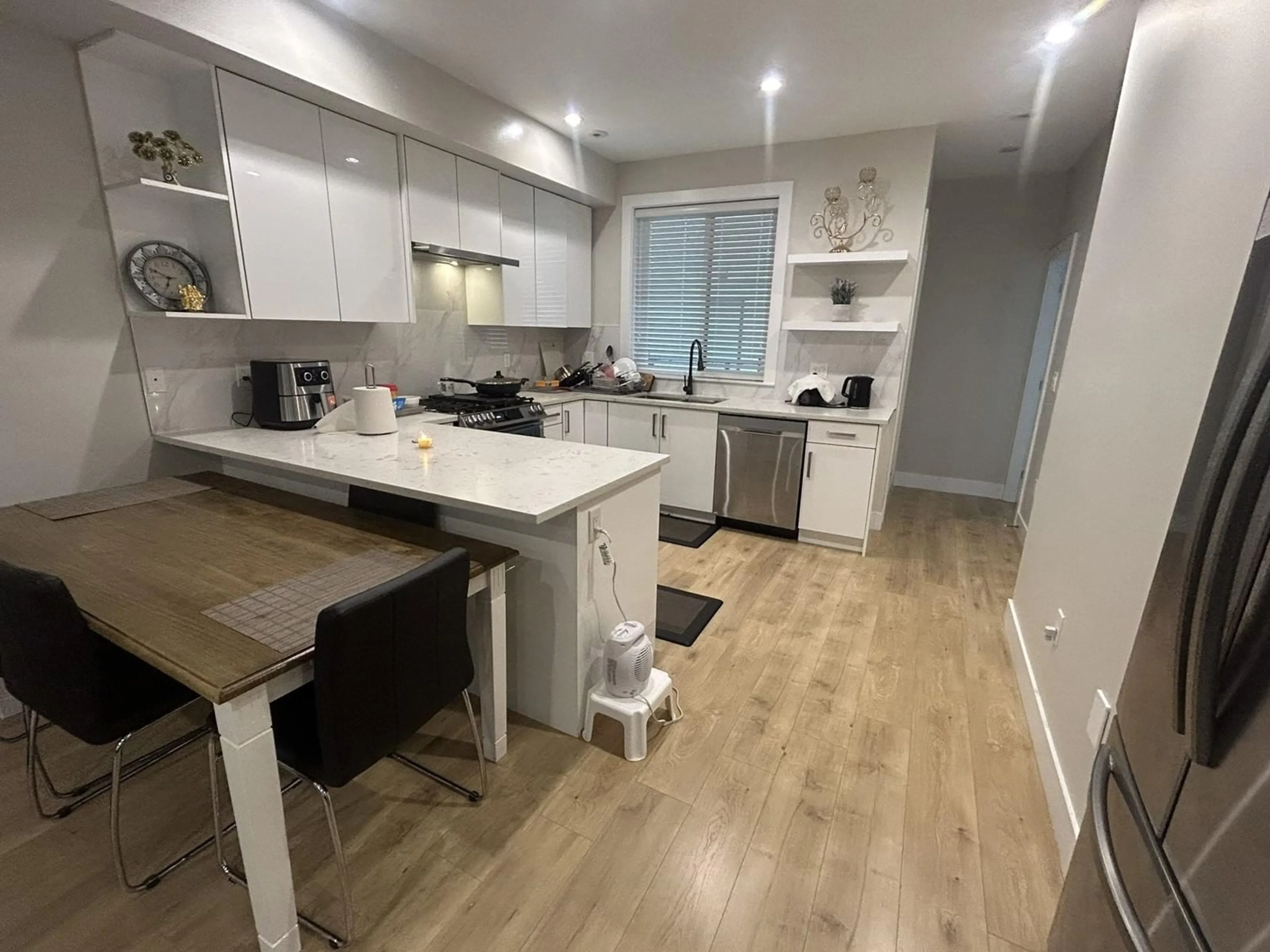 Open concept kitchen, wood/laminate floor for 31 16511 WATSON DRIVE, Surrey British Columbia V4N6T7