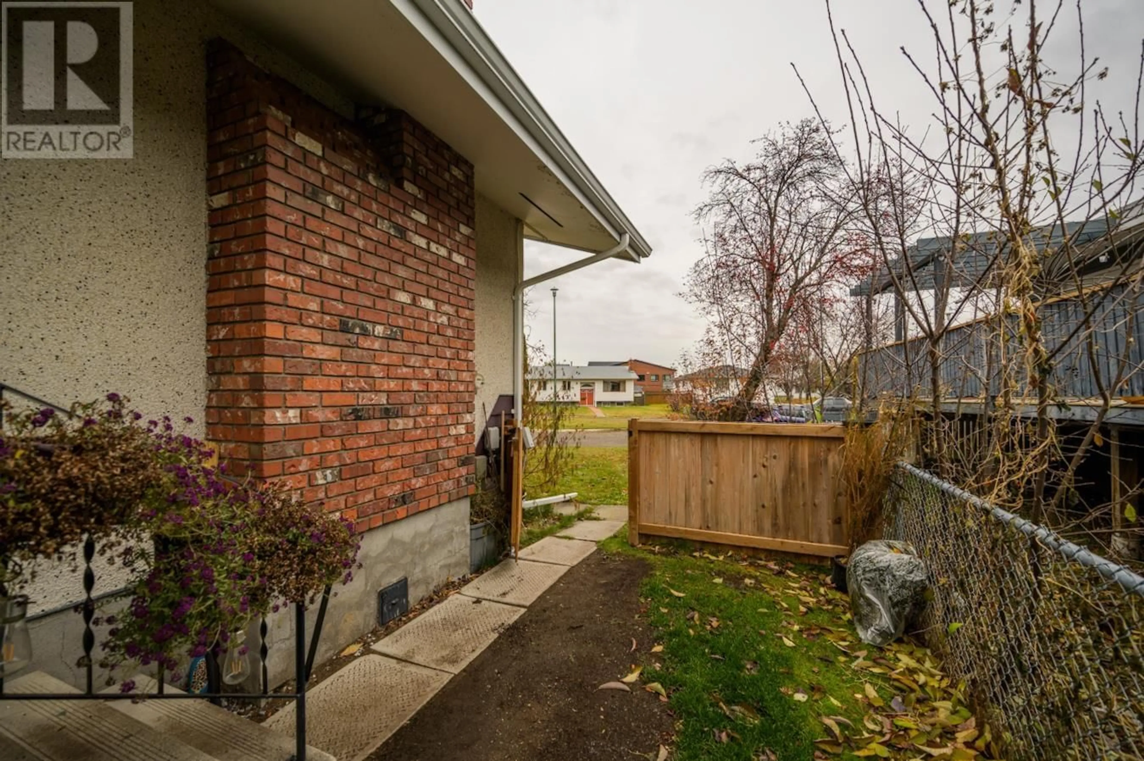 Frontside or backside of a home, the fenced backyard for 639 VEDDER CRESCENT, Prince George British Columbia V2M3S8