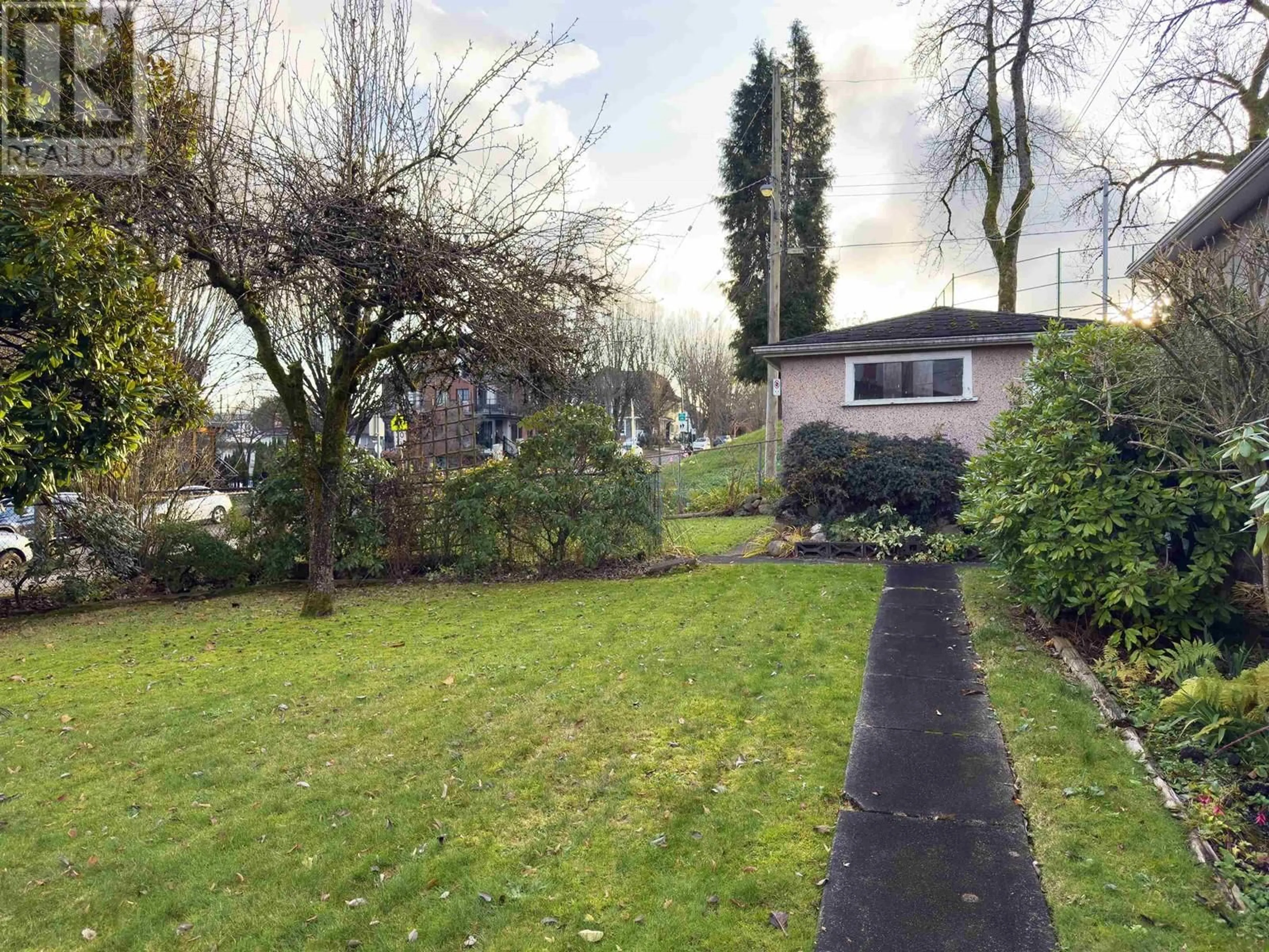 Frontside or backside of a home, the fenced backyard for 2770 EUCLID AVENUE, Vancouver British Columbia V5R5B9