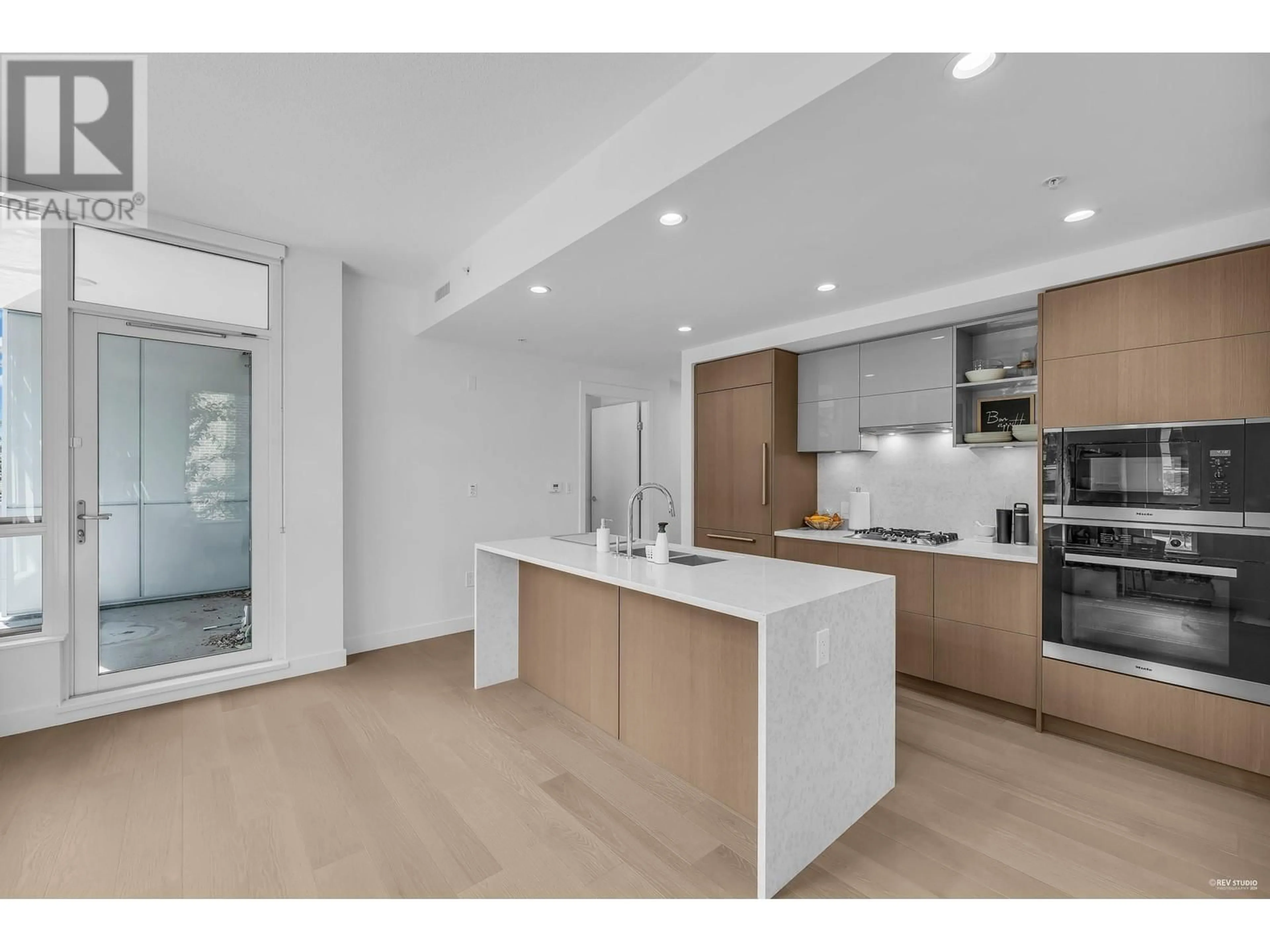 Open concept kitchen, unknown for 210 - 469 KING EDWARD AVENUE, Vancouver British Columbia V5Y2J3