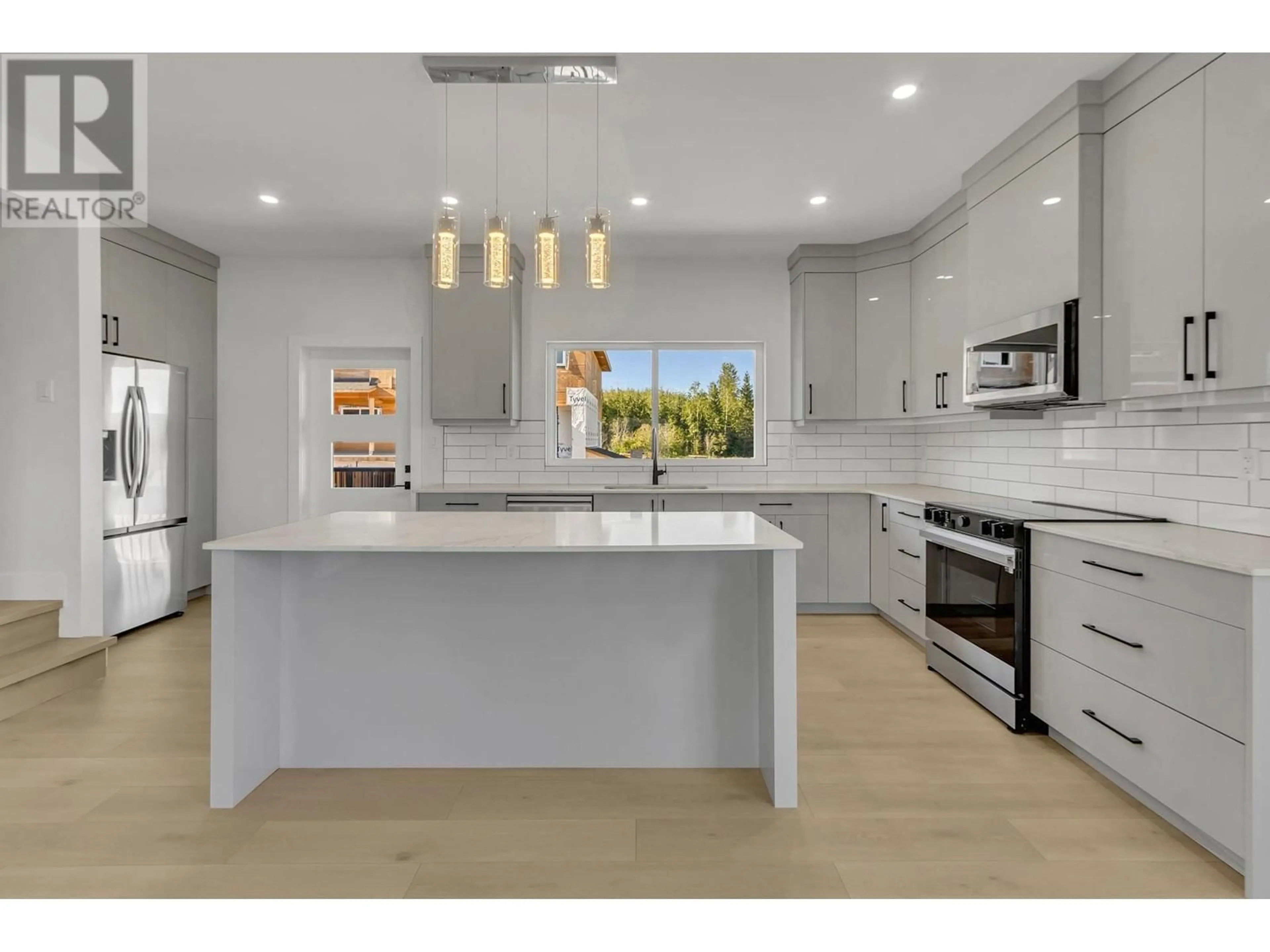 Open concept kitchen, ceramic/tile floor for 2395 ROWE STREET, Prince George British Columbia V2N0J3