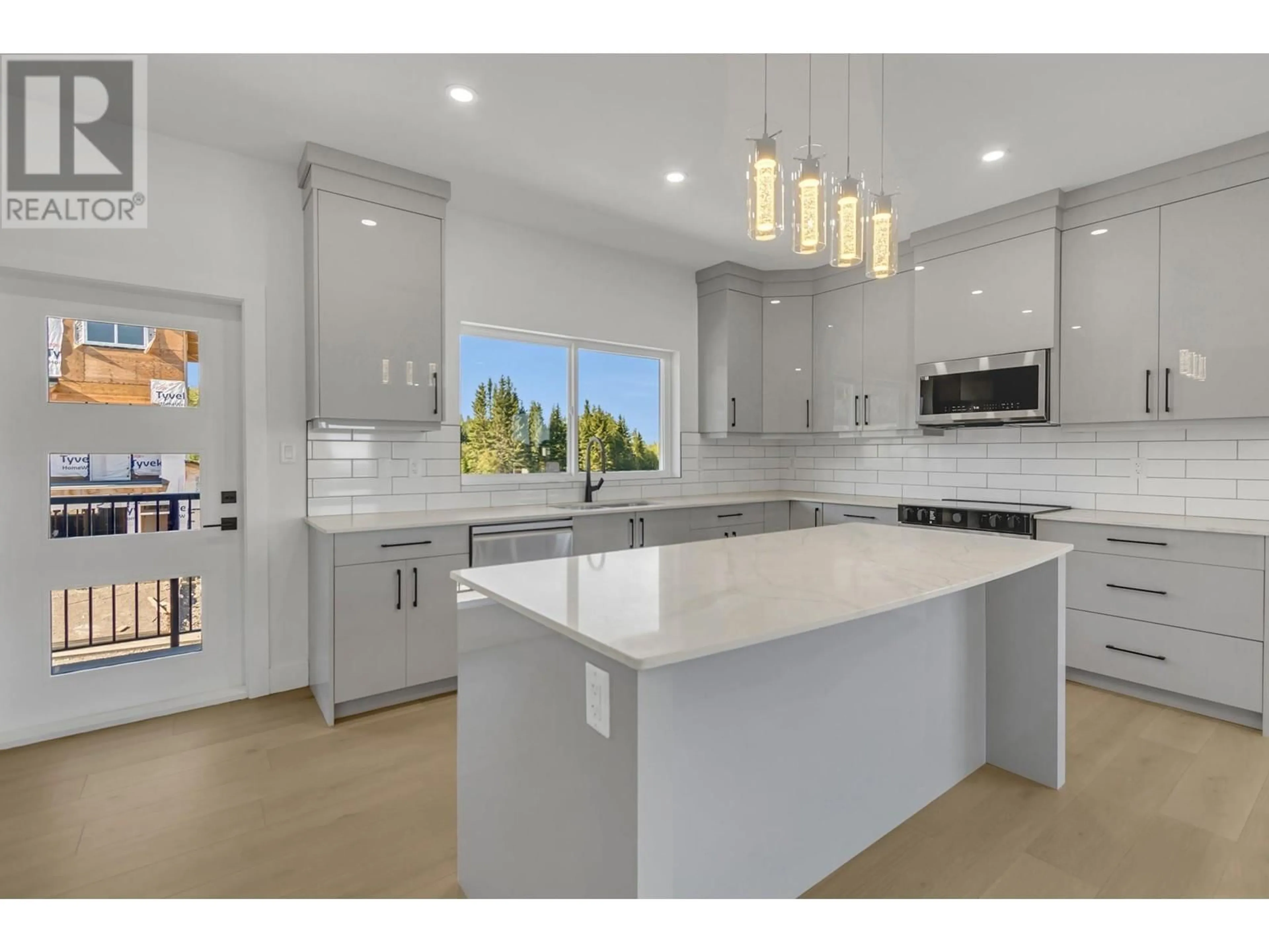 Open concept kitchen, ceramic/tile floor for 2395 ROWE STREET, Prince George British Columbia V2N0J3