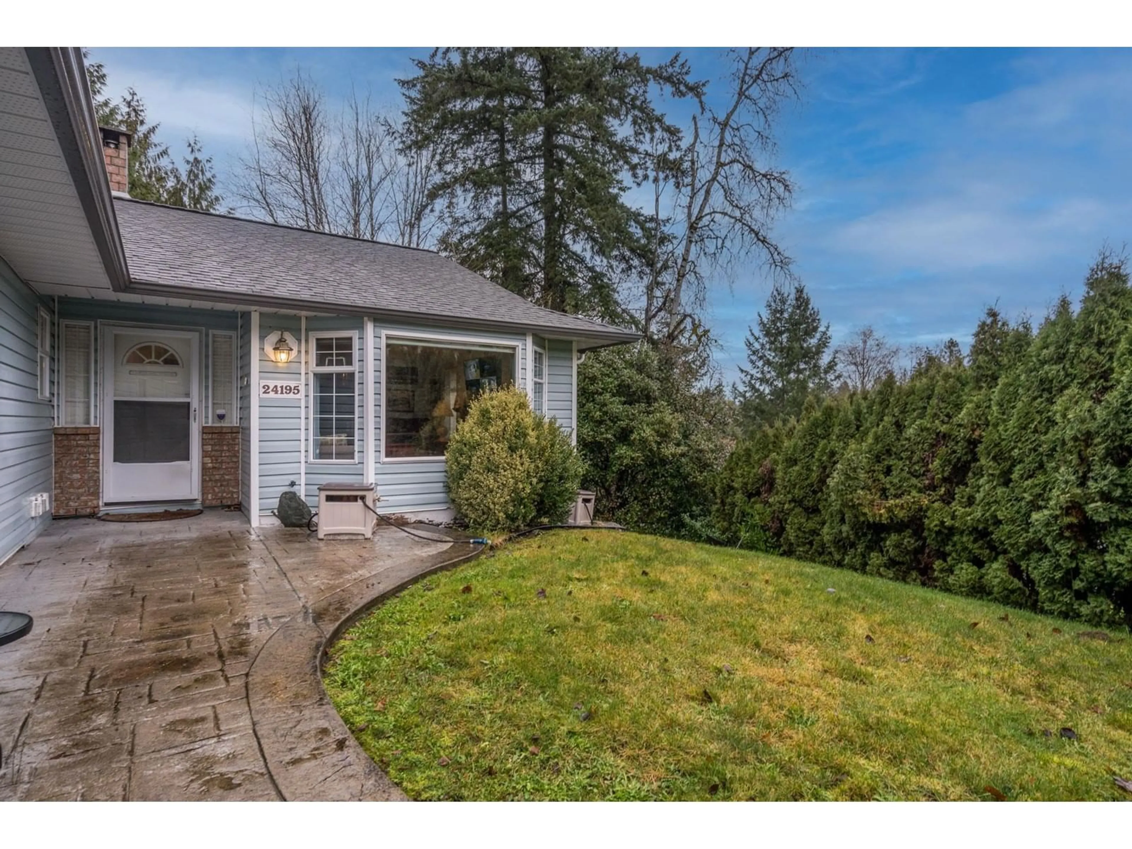 Frontside or backside of a home, the fenced backyard for 24195 60 AVENUE, Langley British Columbia V2Z2G5