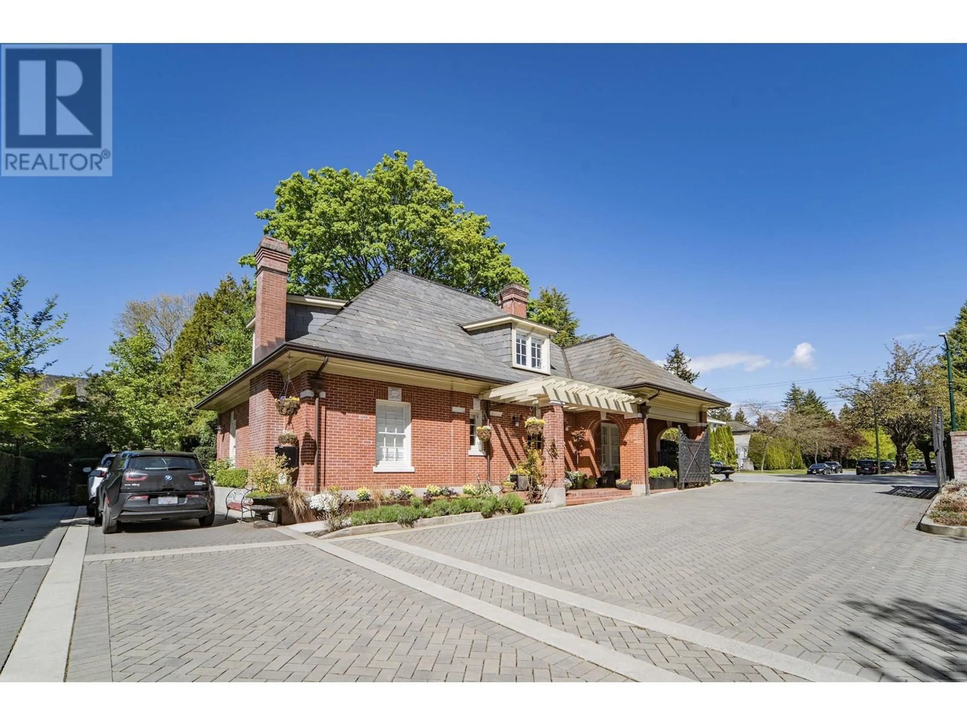 Home with brick exterior material, street for 1501 ATLAS LANE, Vancouver British Columbia V6P0C9