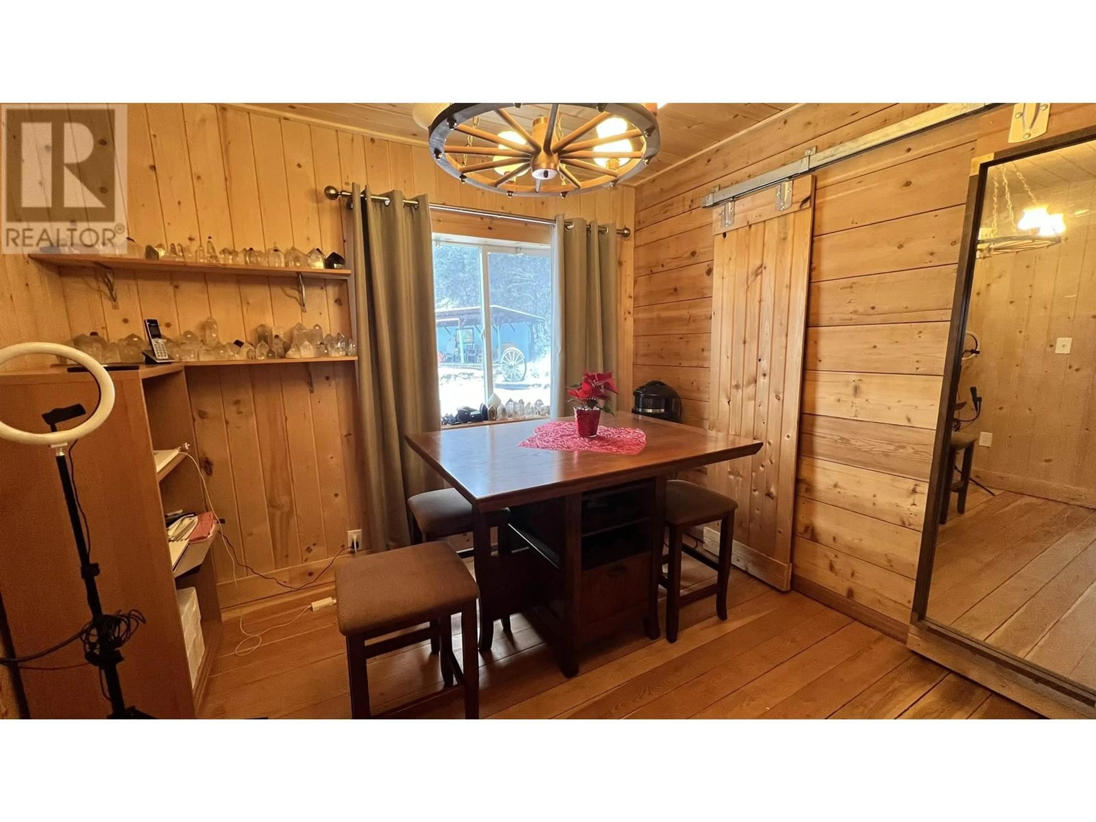 Dining room, wood floors, cottage for 6831 SODA CREEK ROAD, McLeese Lake British Columbia V0L1P0