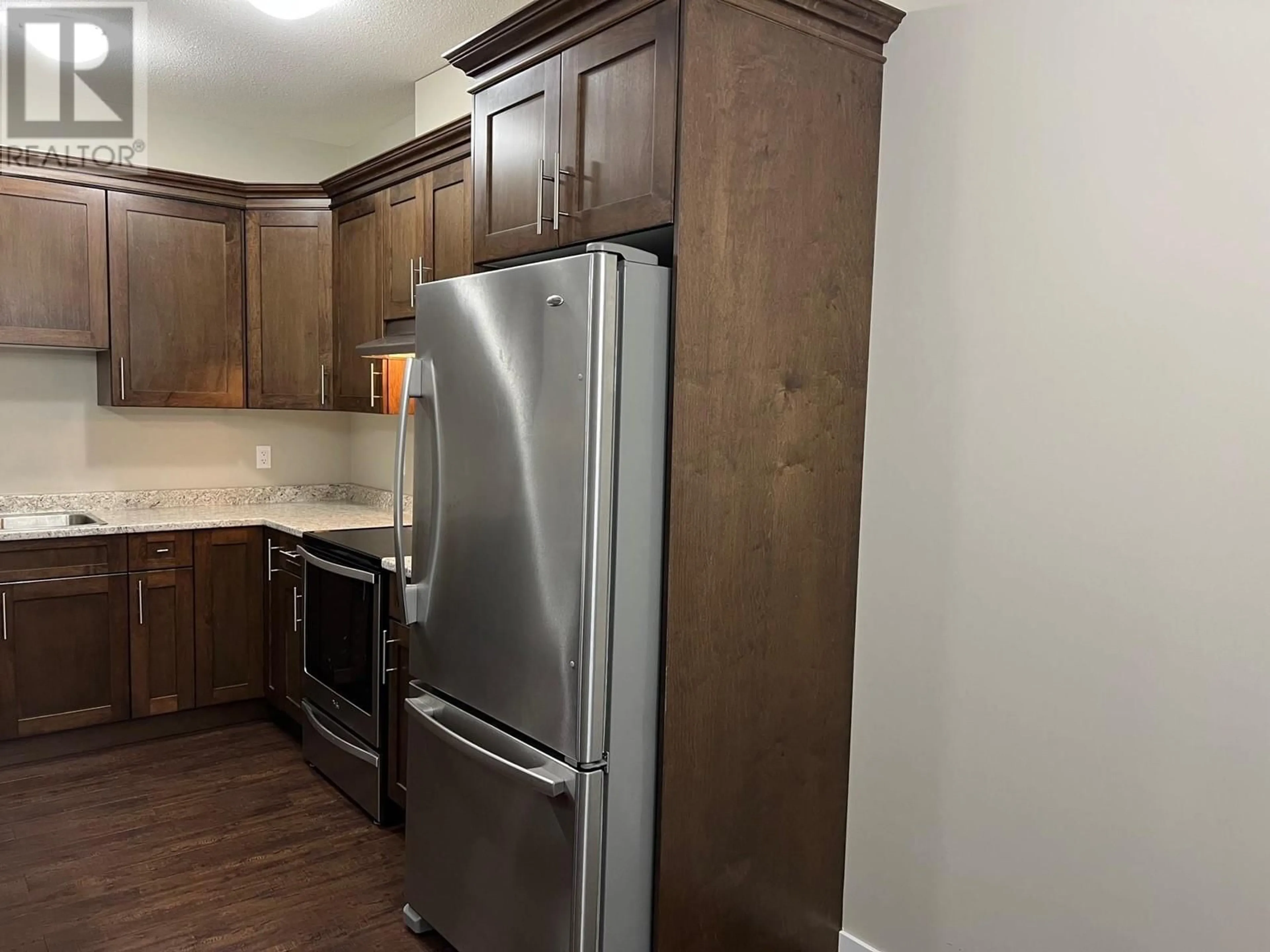 Standard kitchen, wood/laminate floor for 23 9707 99 AVENUE, Taylor British Columbia V0C2K0