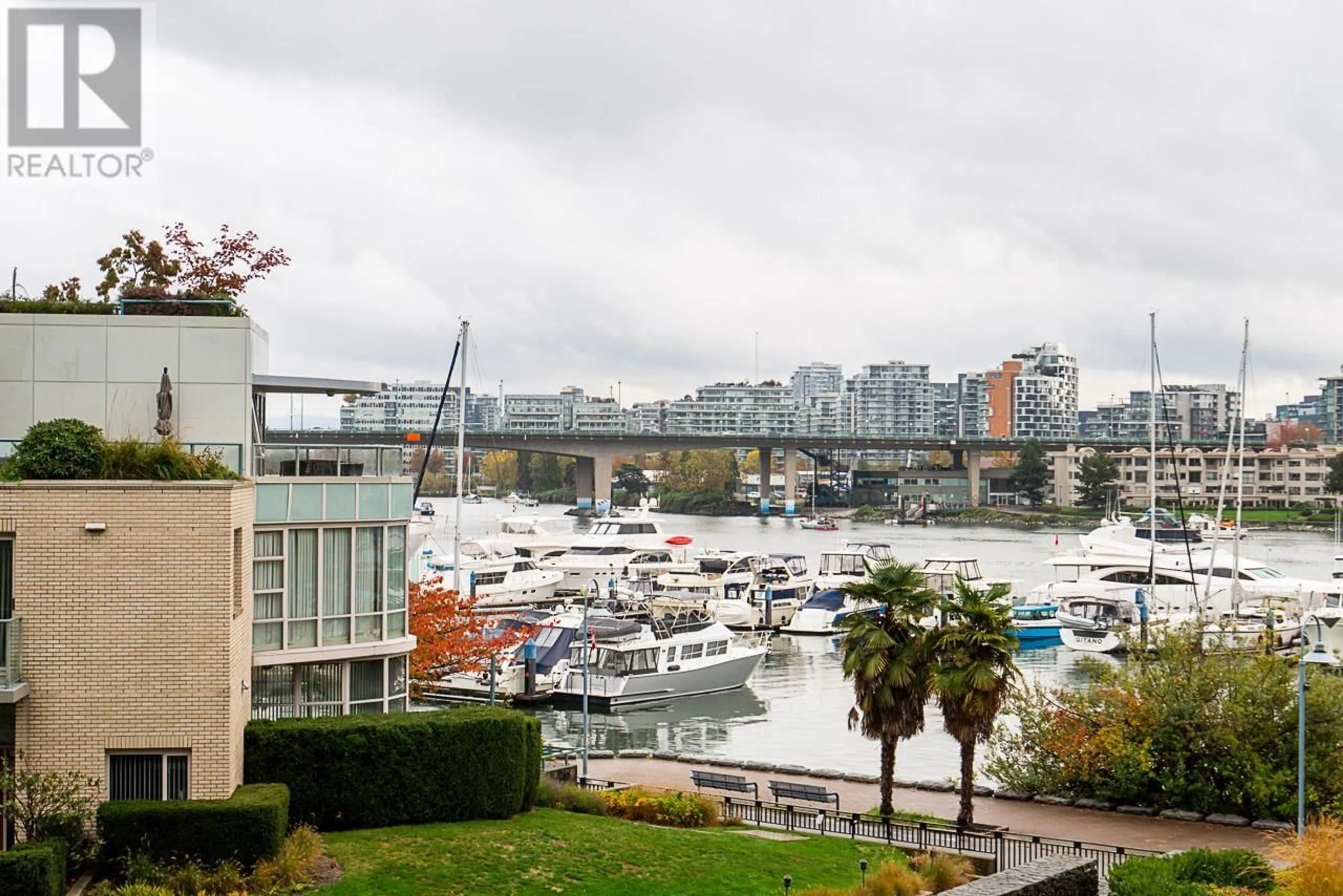 A pic from exterior of the house or condo, the view of lake or river for 309 1288 MARINASIDE CRESCENT, Vancouver British Columbia V6Z2W5