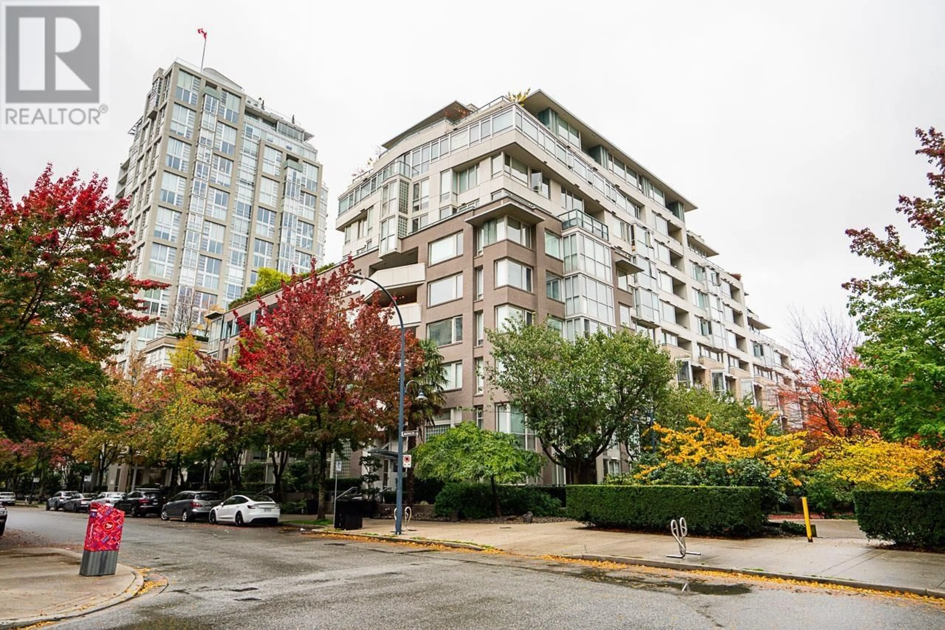 A pic from exterior of the house or condo, the street view for 309 1288 MARINASIDE CRESCENT, Vancouver British Columbia V6Z2W5