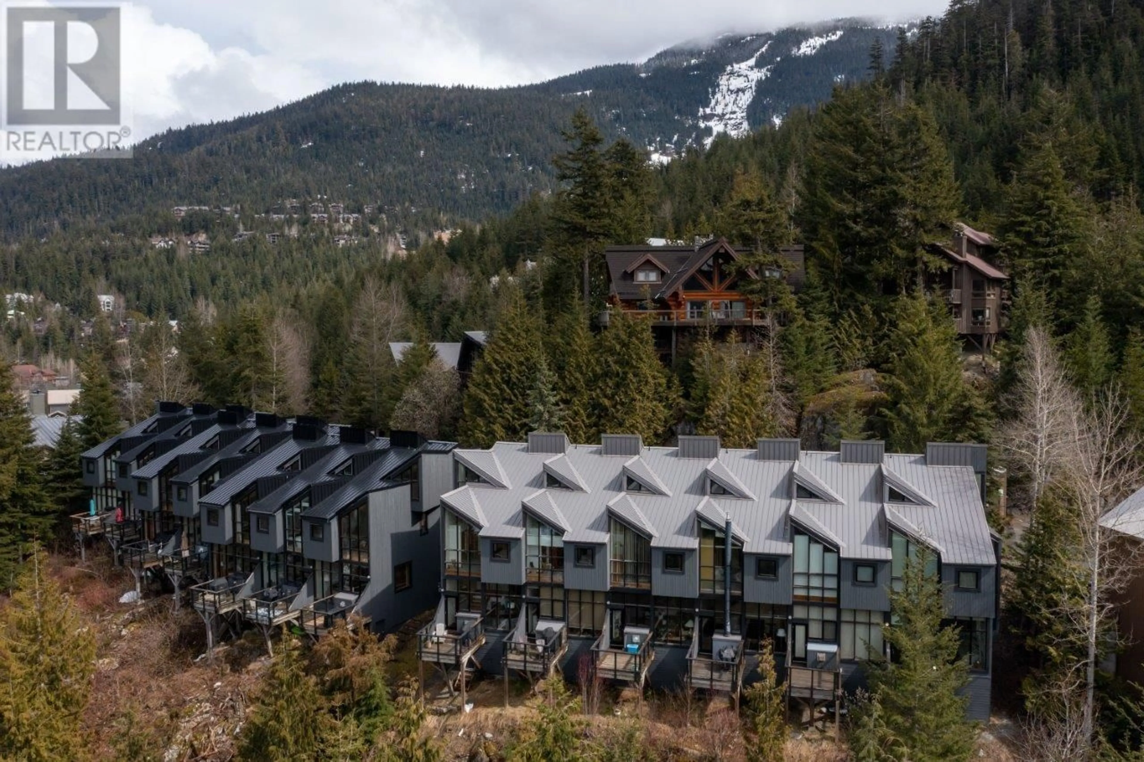 A pic from outside/outdoor area/front of a property/back of a property/a pic from drone, mountain view for 13 2221 GONDOLA WAY, Whistler British Columbia V8E0M8