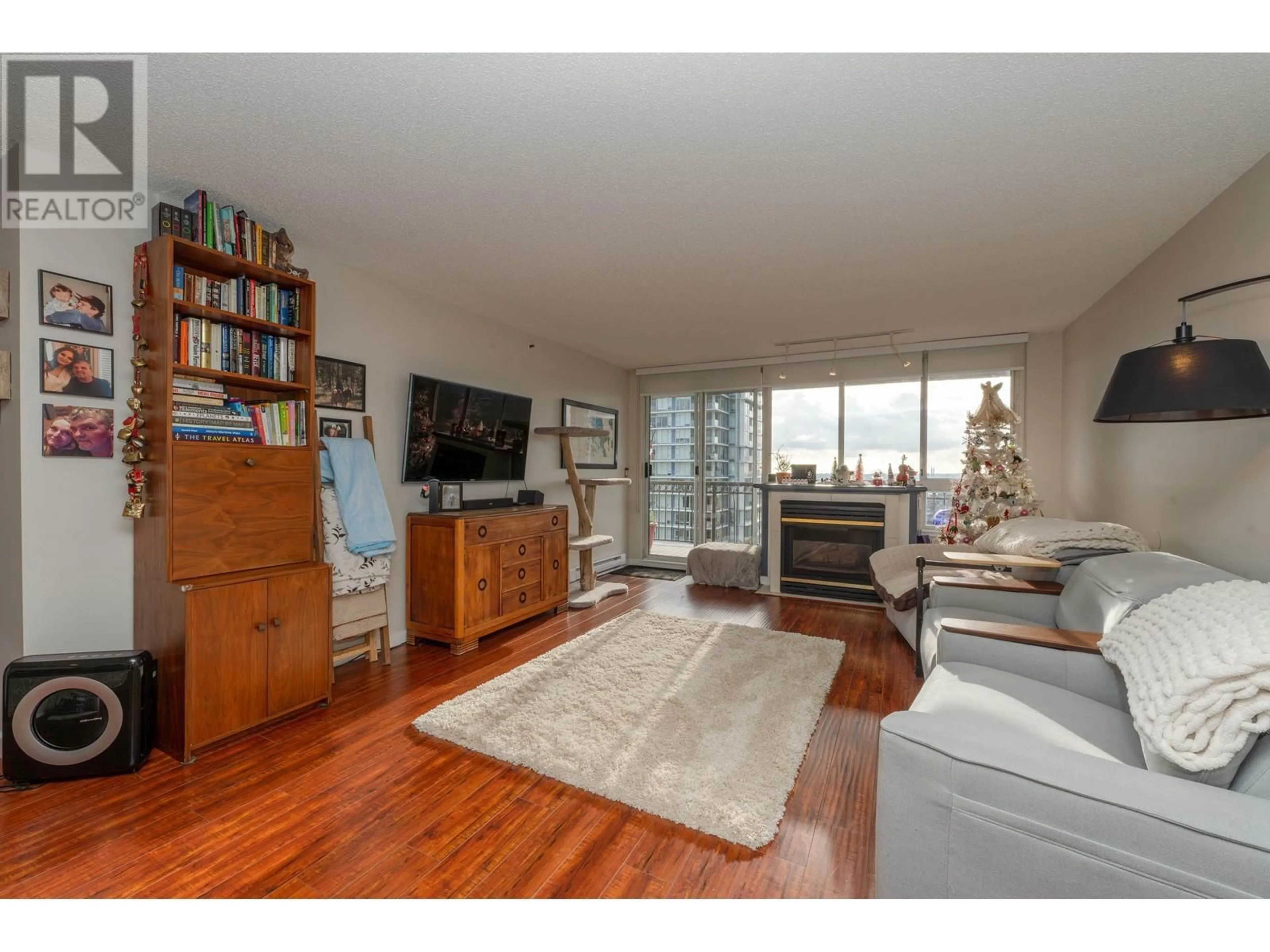 Living room with furniture, wood/laminate floor for 1901 551 AUSTIN AVENUE, Coquitlam British Columbia V3K6R7