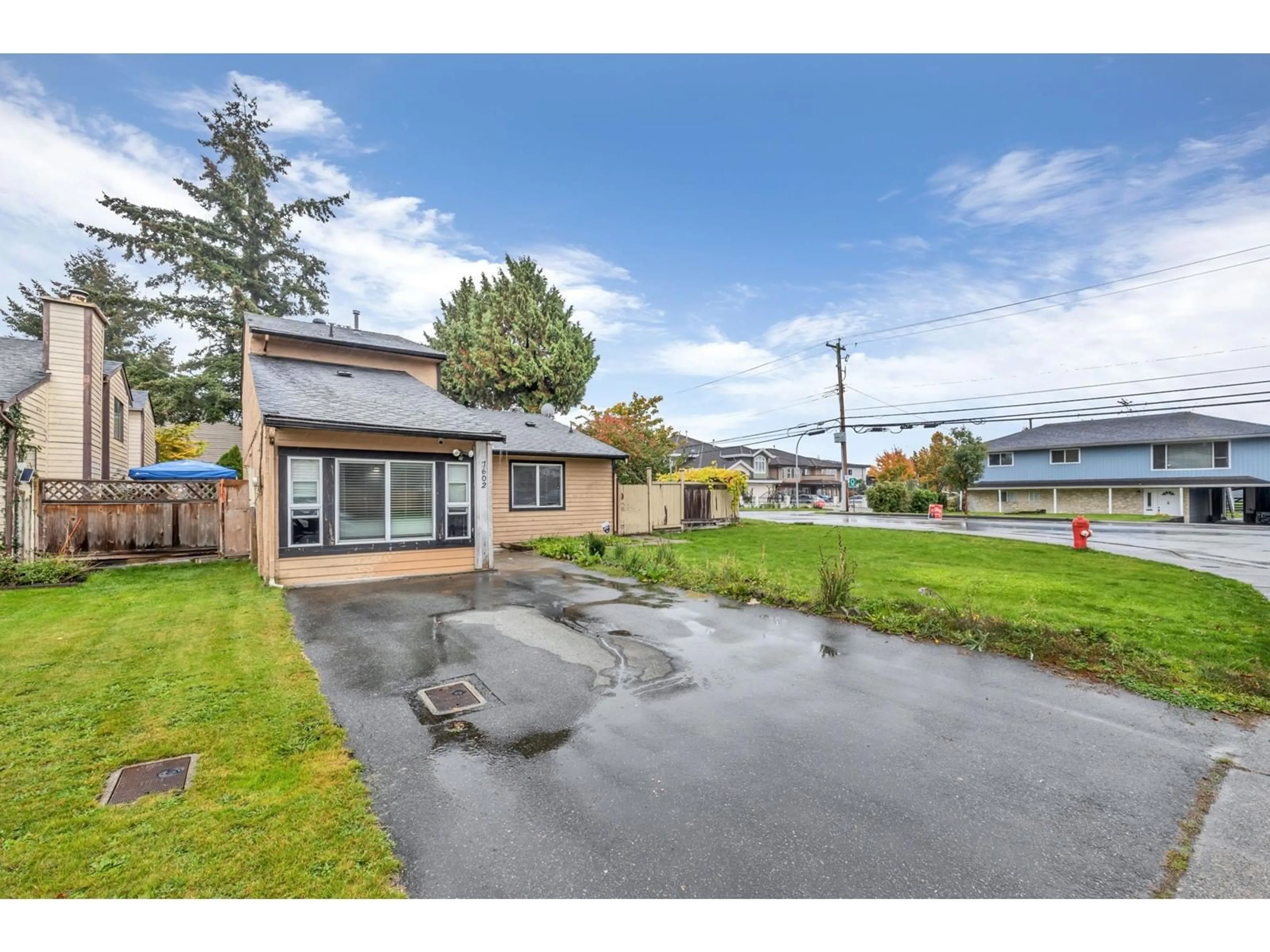 A pic from outside/outdoor area/front of a property/back of a property/a pic from drone, street for 7602 125 STREET, Surrey British Columbia V3W7W3