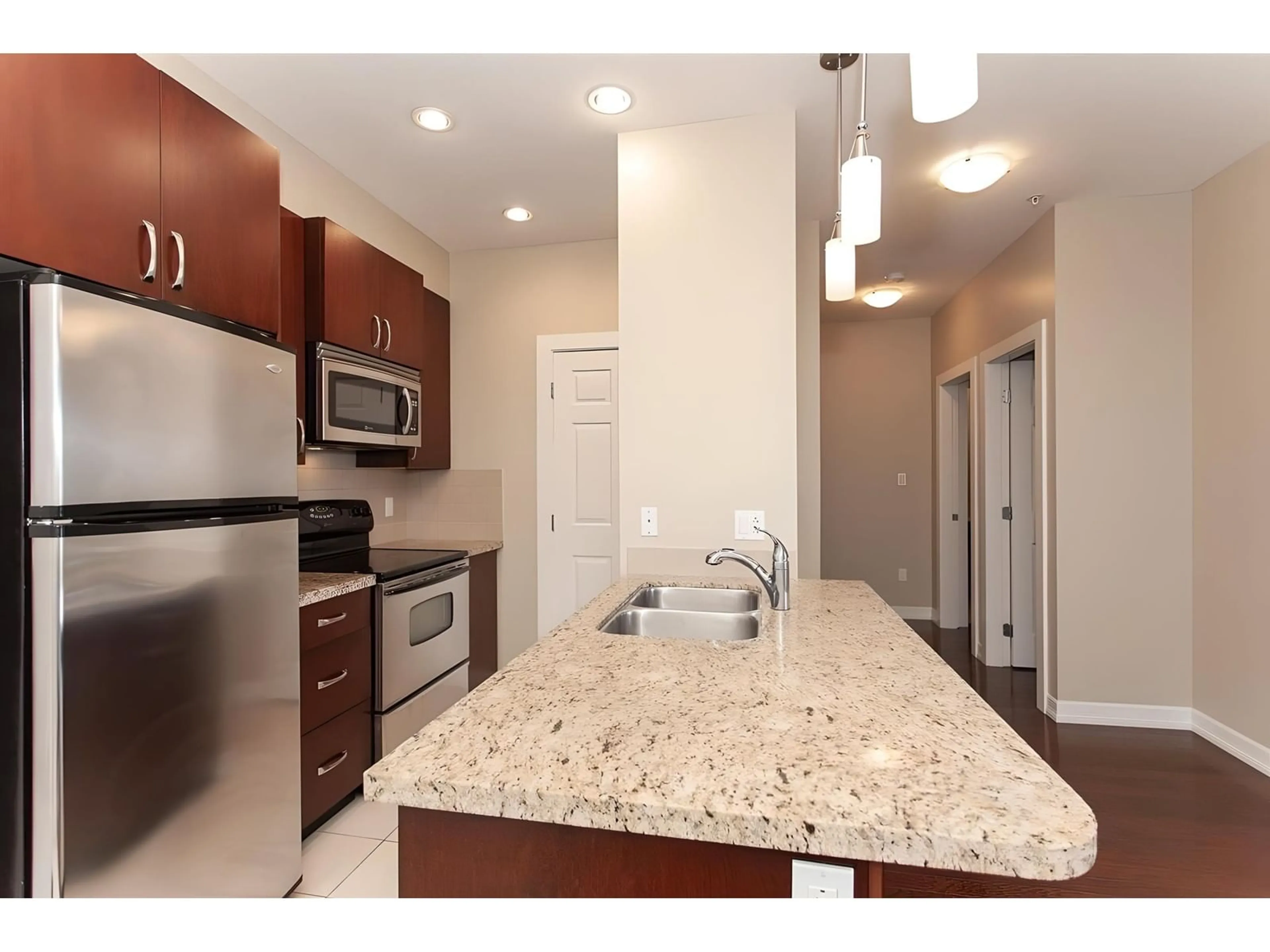 Open concept kitchen, ceramic/tile floor for 302 10237 133 STREET, Surrey British Columbia V3T0C6