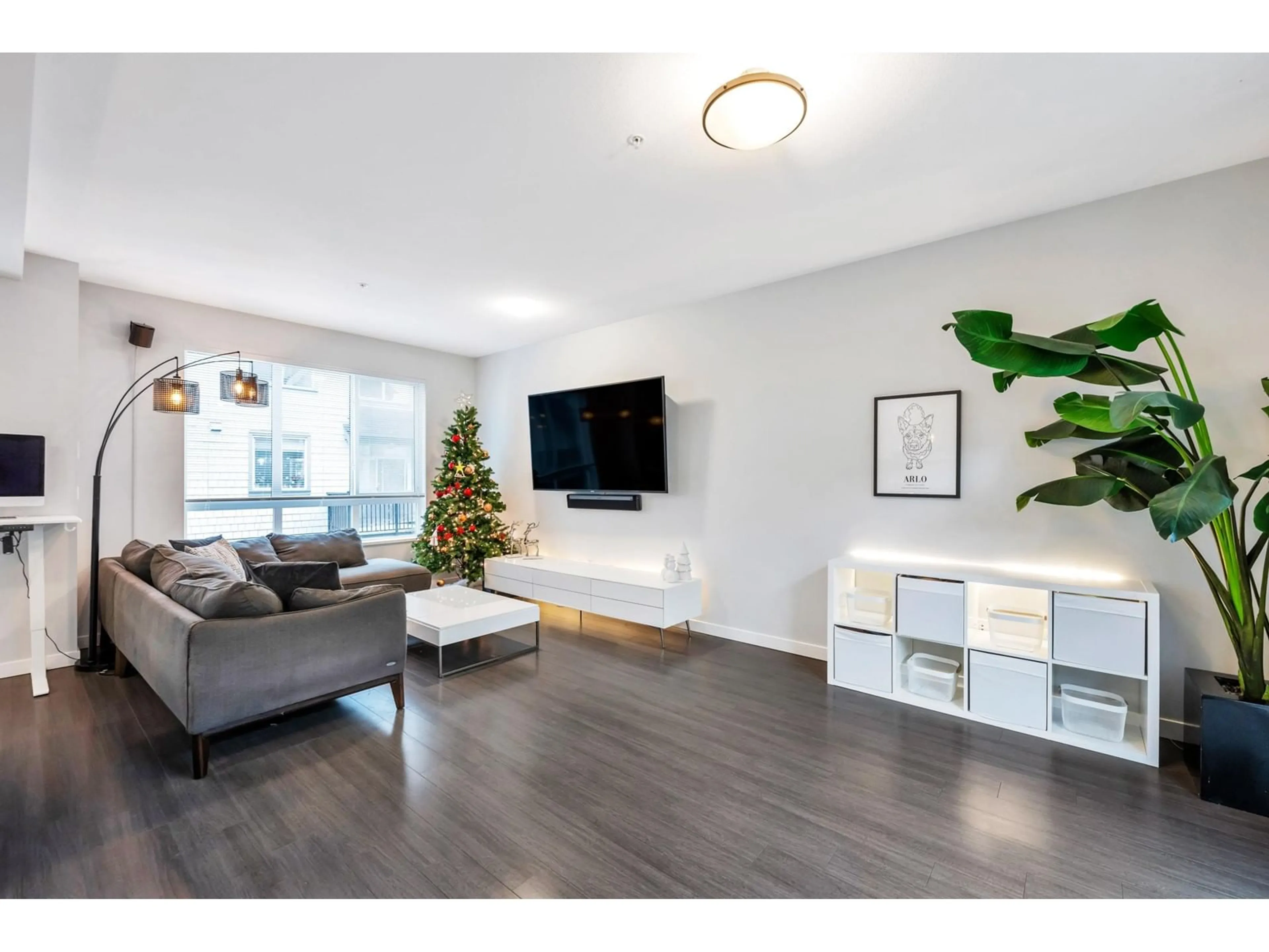 Living room with furniture, wood/laminate floor for 22 8138 204 STREET, Langley British Columbia V2Y0T4