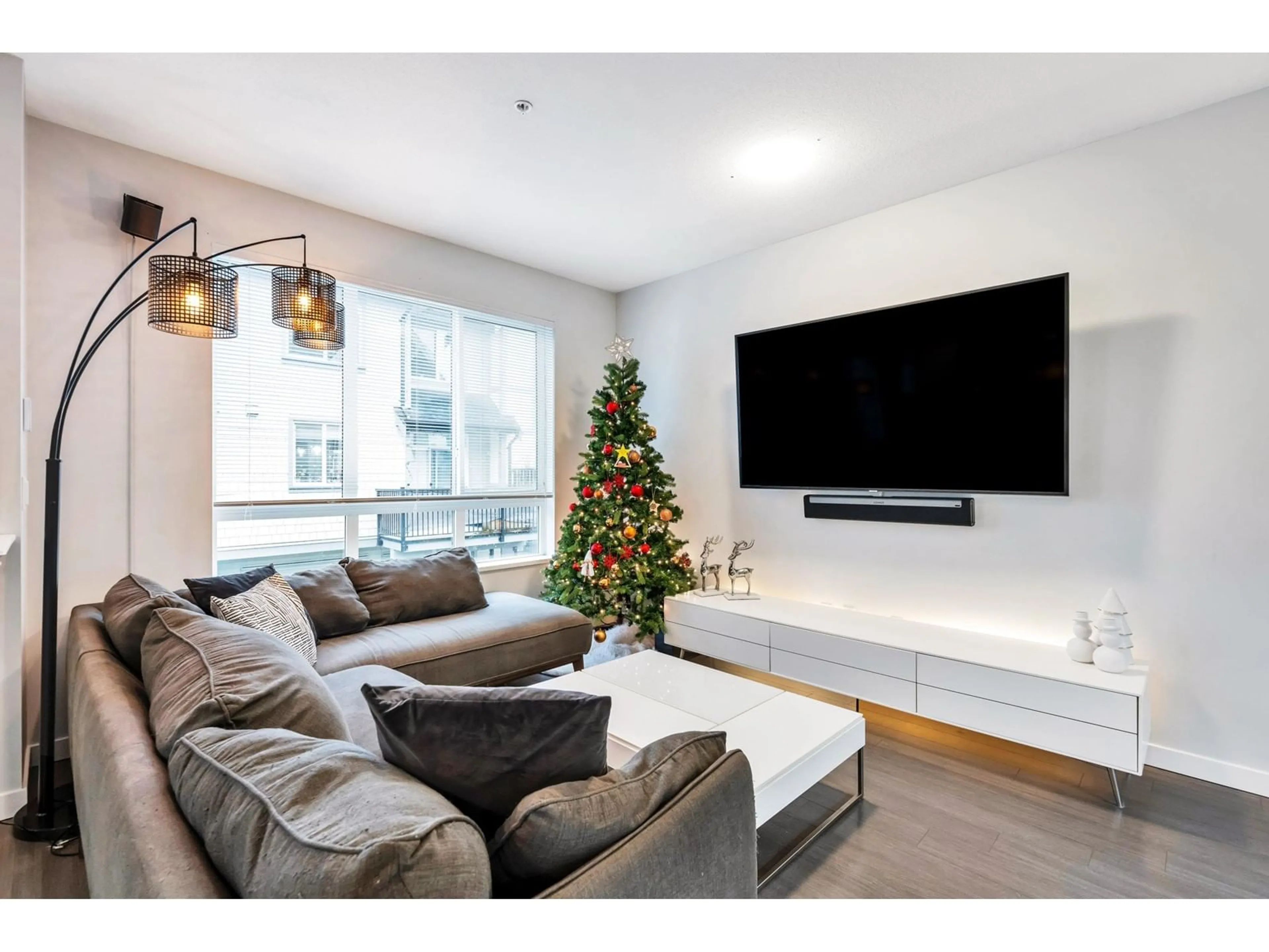 Living room with furniture, wood/laminate floor for 22 8138 204 STREET, Langley British Columbia V2Y0T4