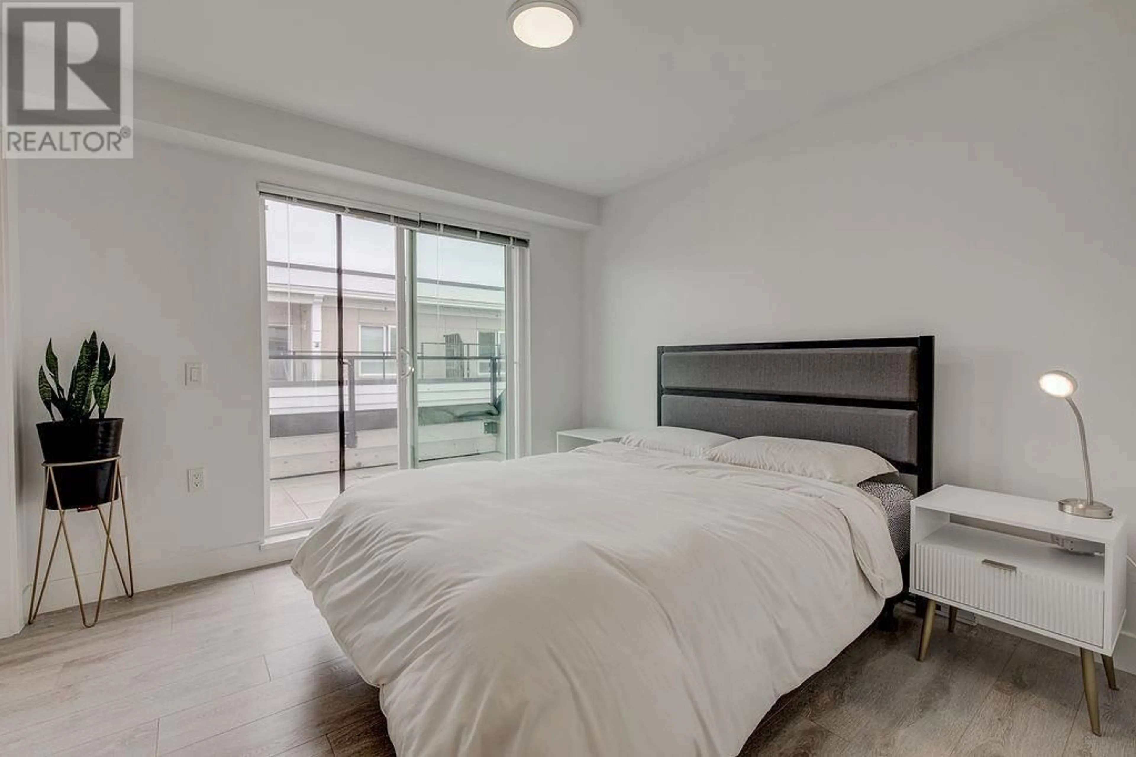 Bedroom with bed, unknown for 225 4858 SLOCAN STREET, Vancouver British Columbia V5R2A3