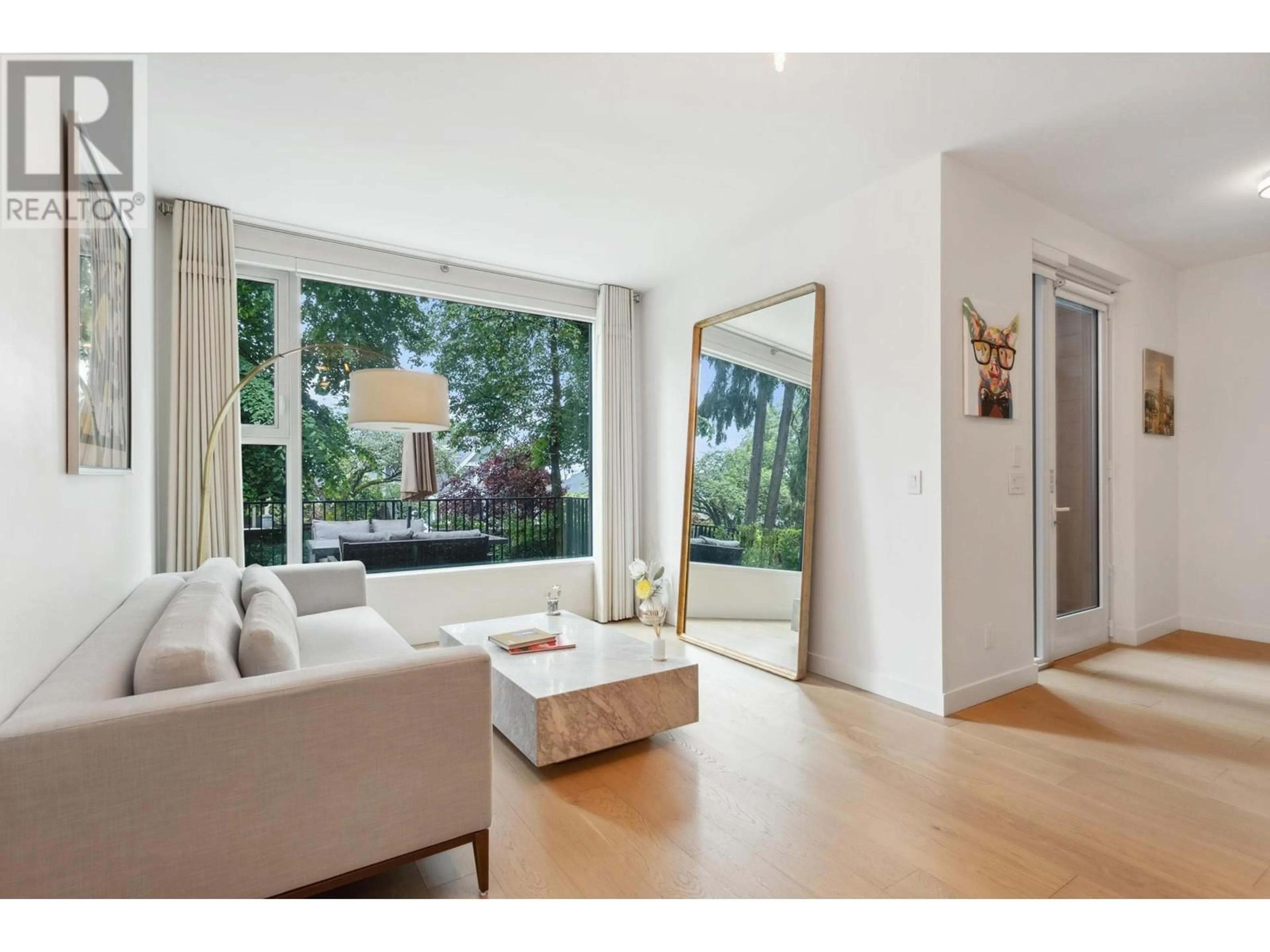 Living room with furniture, wood/laminate floor for 1577 57TH AVENUE, Vancouver British Columbia V6P0H7