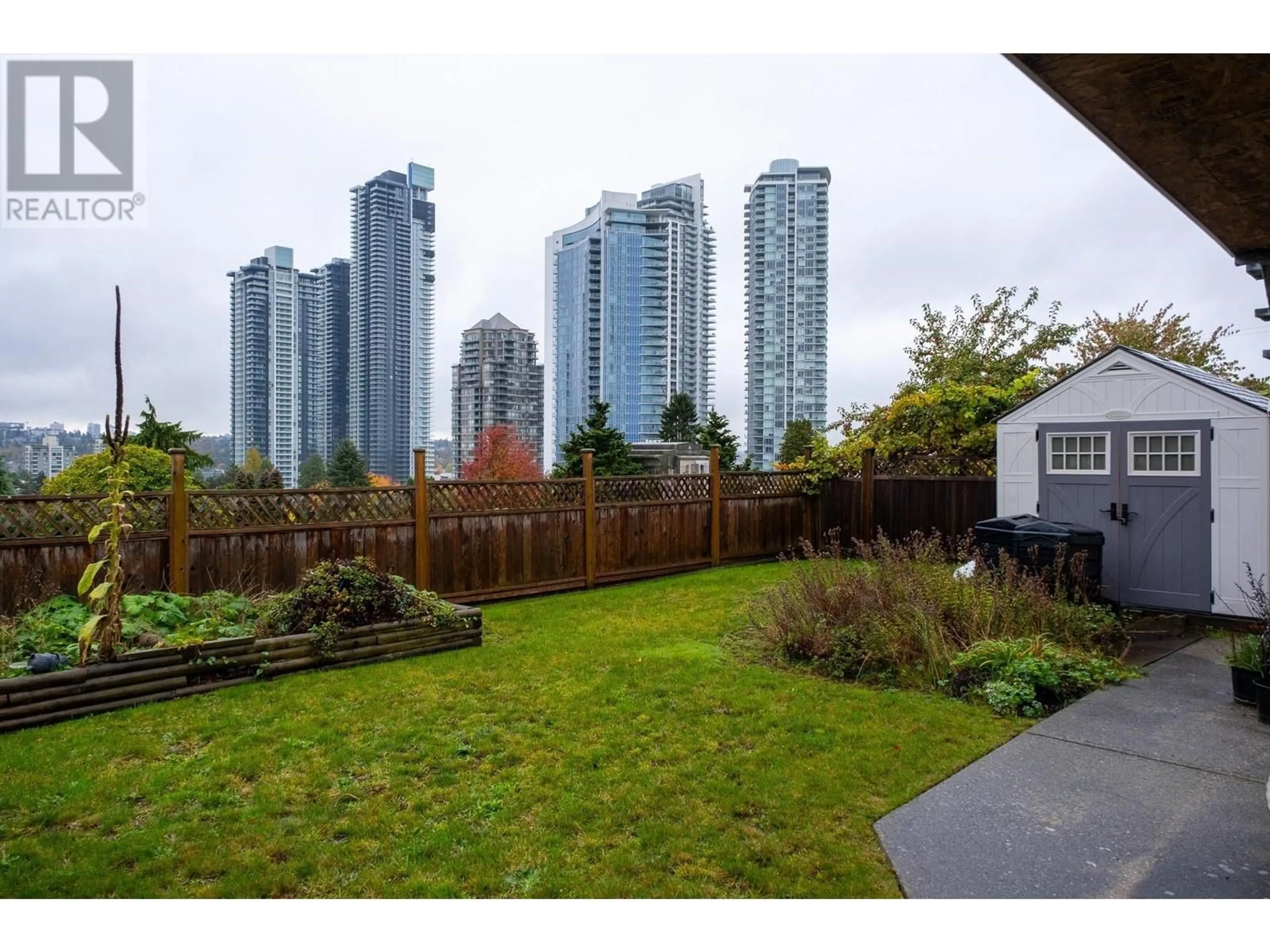 Patio, city buildings view from balcony for 4260 GRAVELEY STREET, Burnaby British Columbia V5C3T8