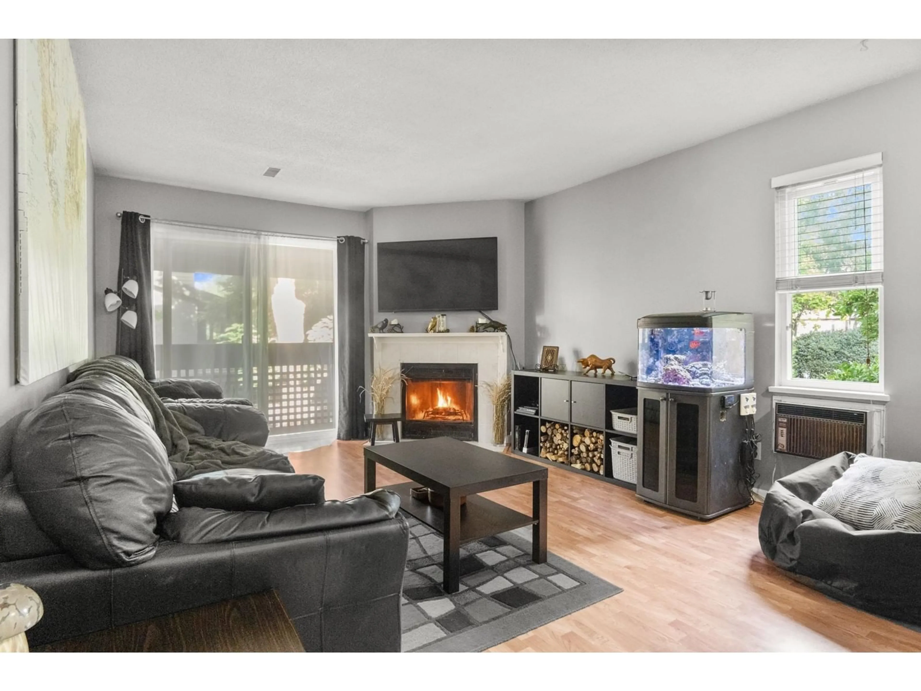 Living room with furniture, wood/laminate floor for 124 34909 OLD YALE ROAD, Abbotsford British Columbia V3G2E7