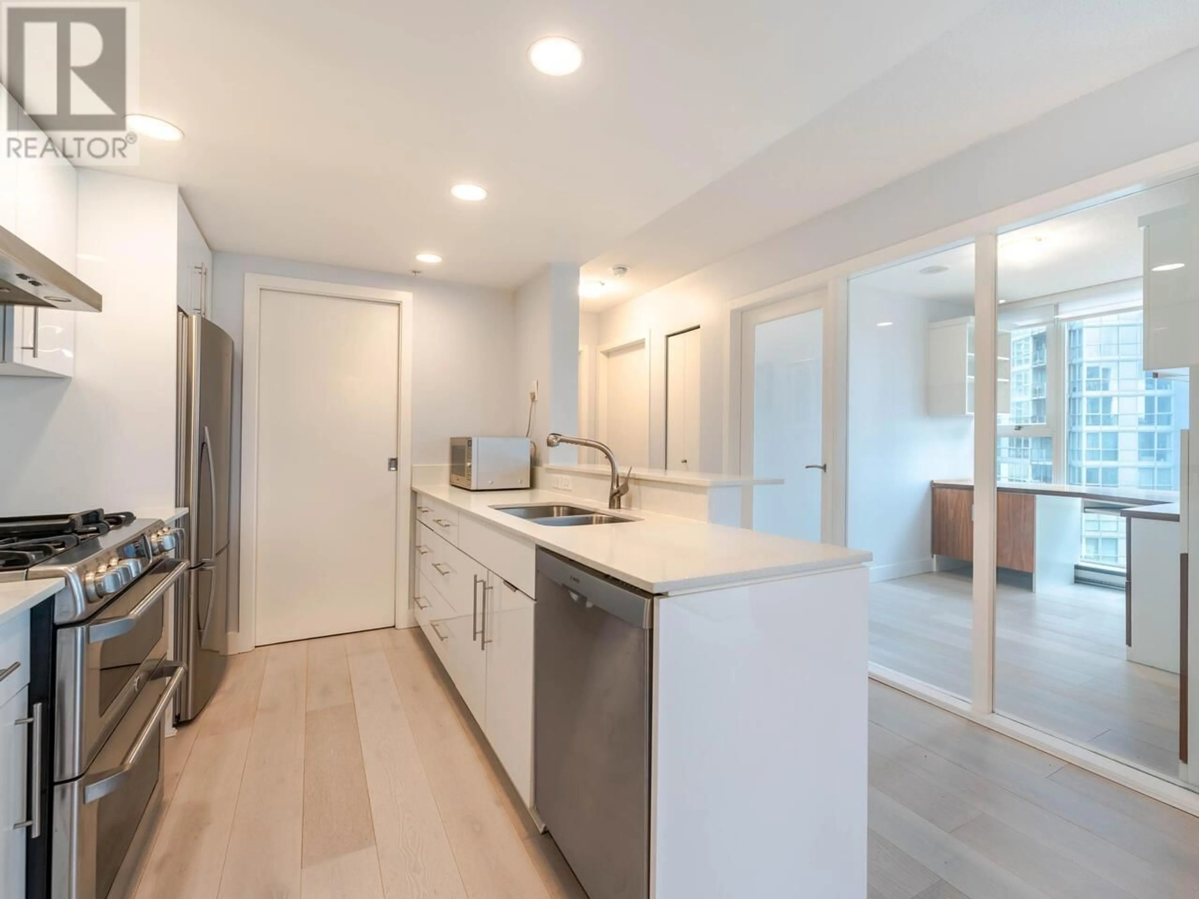 Open concept kitchen, ceramic/tile floor for 1201 455 BEACH CRESCENT, Vancouver British Columbia V6Z3E5