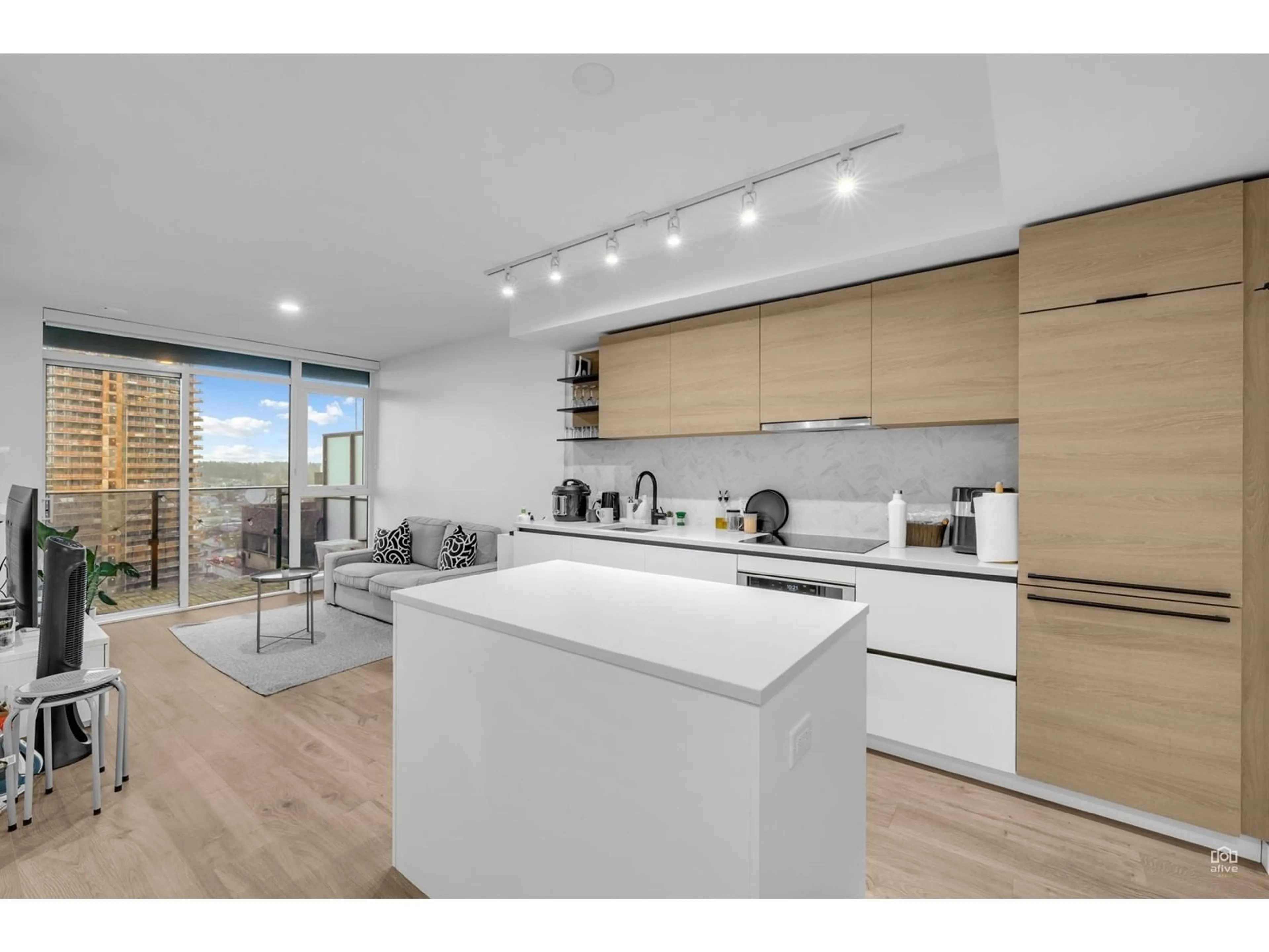 Open concept kitchen, wood/laminate floor for 1705 10448 UNIVERSITY DRIVE, Surrey British Columbia V3T0S7