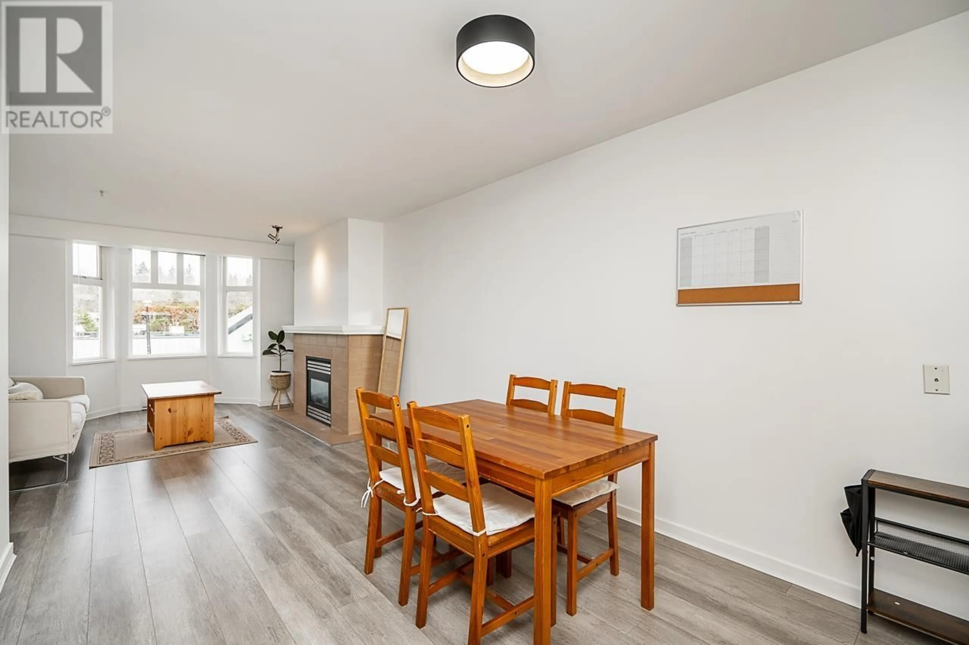 Dining room, wood/laminate floor for 306 3580 W 41ST AVENUE, Vancouver British Columbia V6N3E6