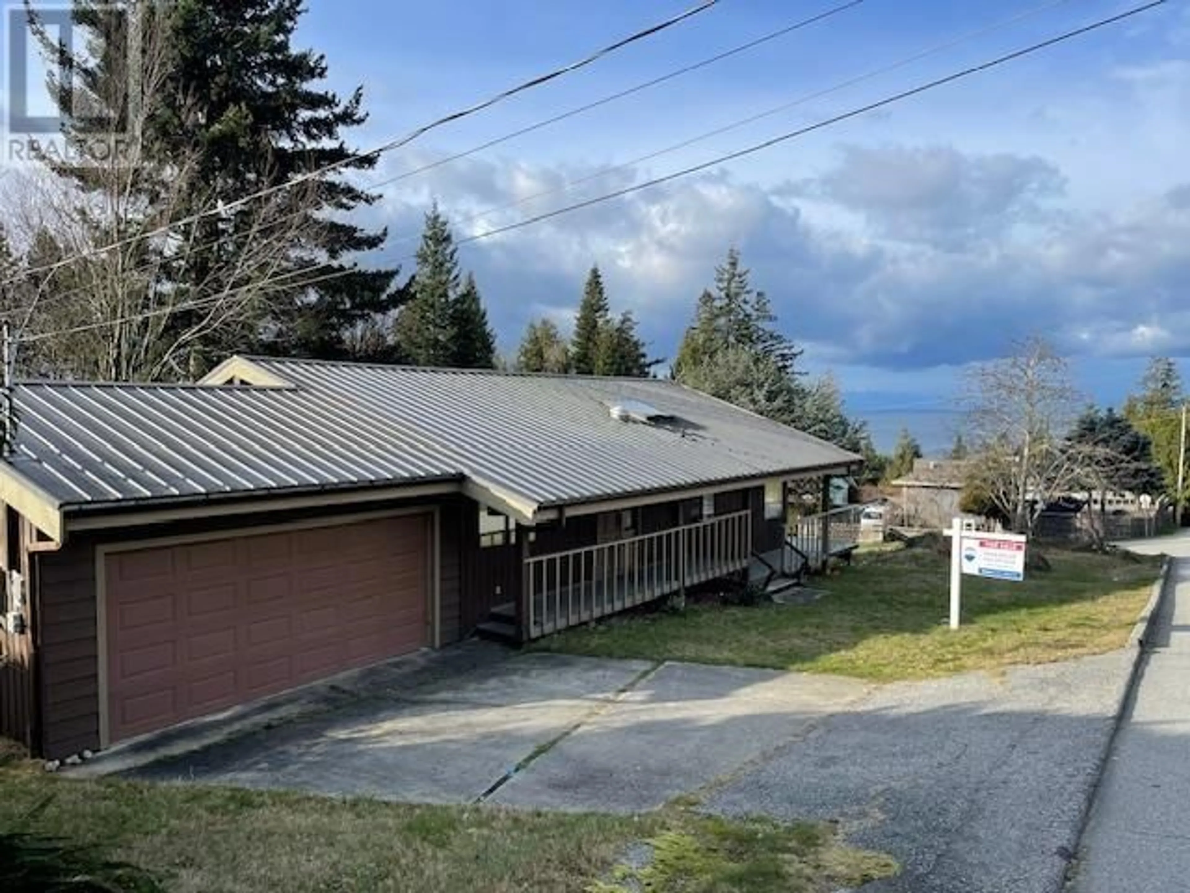 A pic from outside/outdoor area/front of a property/back of a property/a pic from drone, unknown for 5129 CHAPMAN ROAD, Sechelt British Columbia V7Z0B7