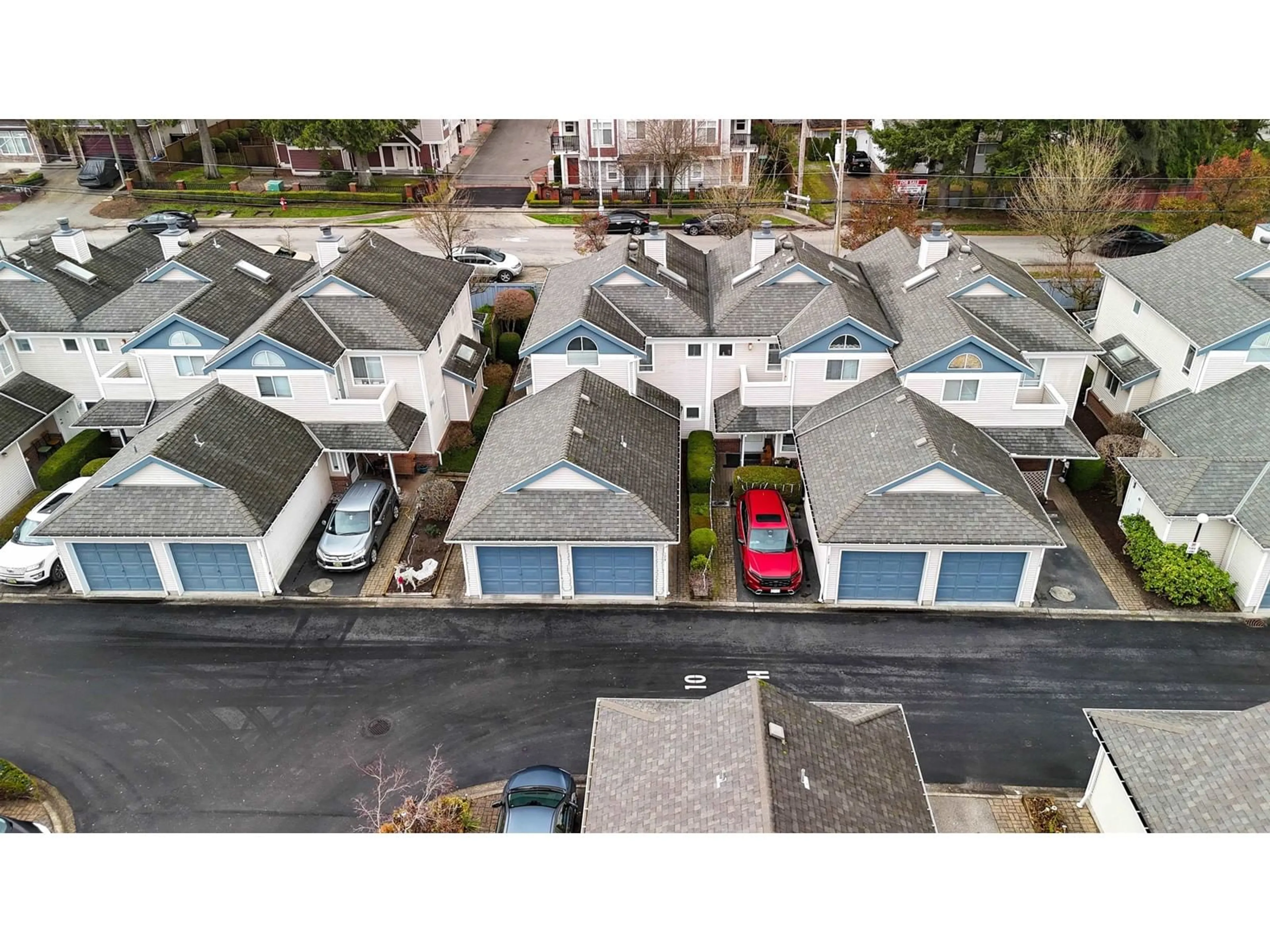 A pic from outside/outdoor area/front of a property/back of a property/a pic from drone, street for 128 14154 103 AVENUE, Surrey British Columbia V3T4Z6