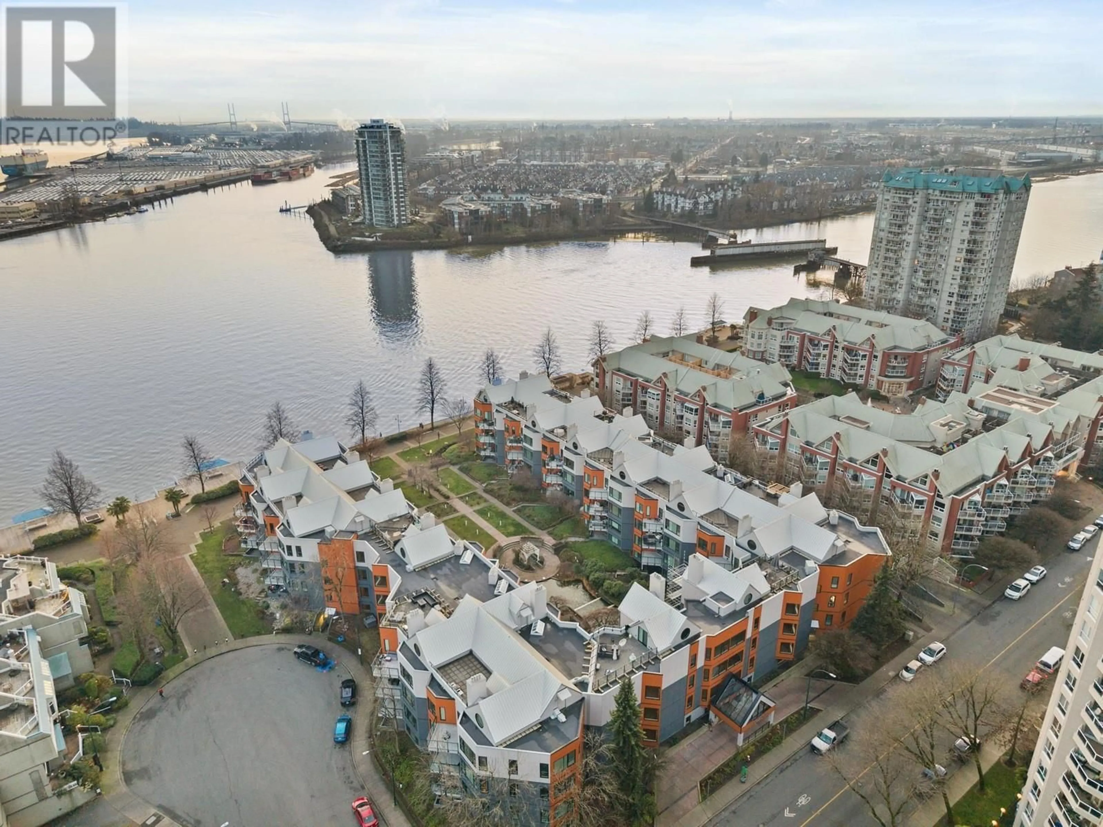 A pic from outside/outdoor area/front of a property/back of a property/a pic from drone, water/lake/river/ocean view for 209 1230 QUAYSIDE DRIVE, New Westminster British Columbia V3M6H1