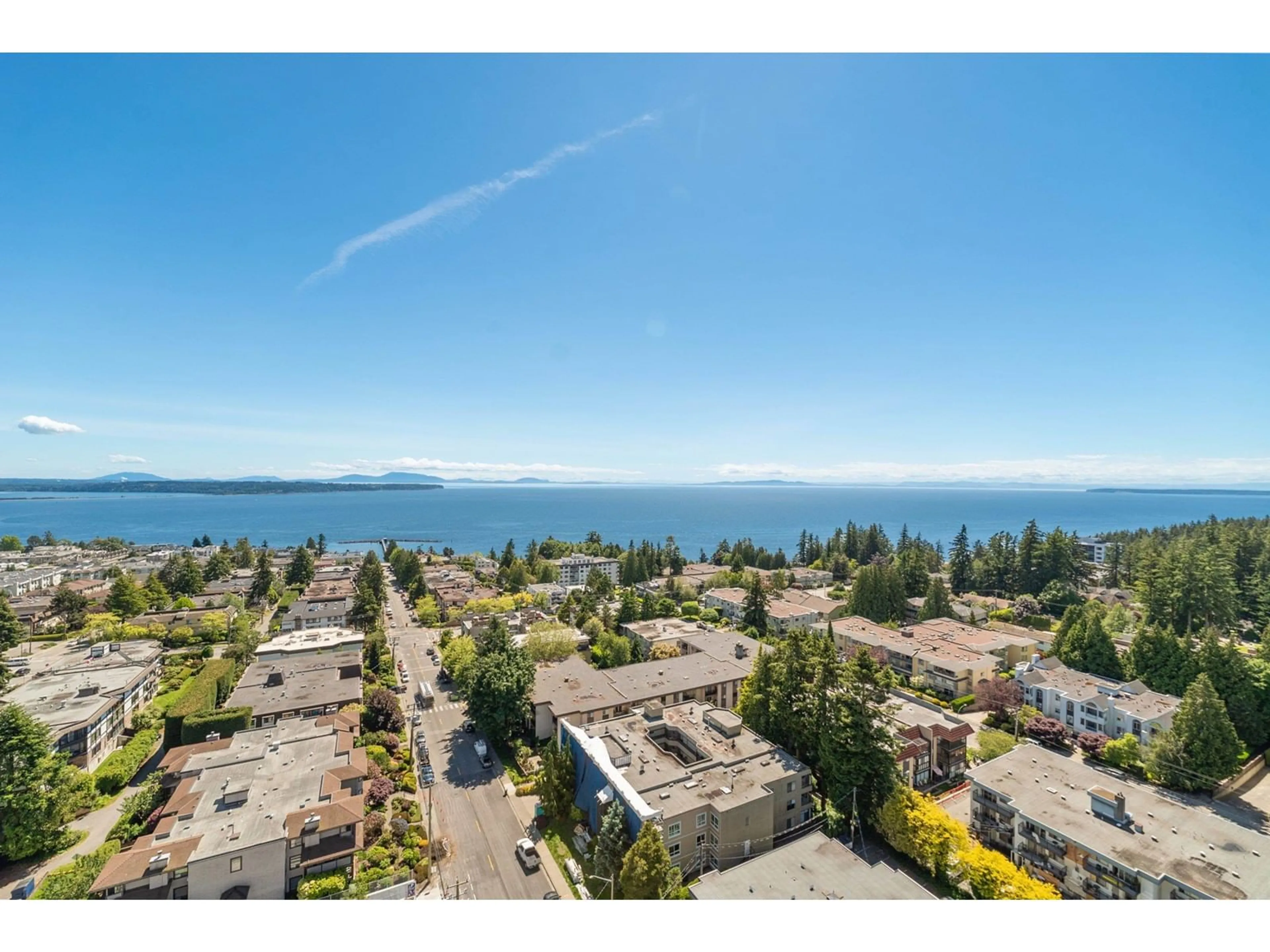 A pic from outside/outdoor area/front of a property/back of a property/a pic from drone, water/lake/river/ocean view for 1701 1500 MARTIN STREET, Surrey British Columbia V3Z2L5