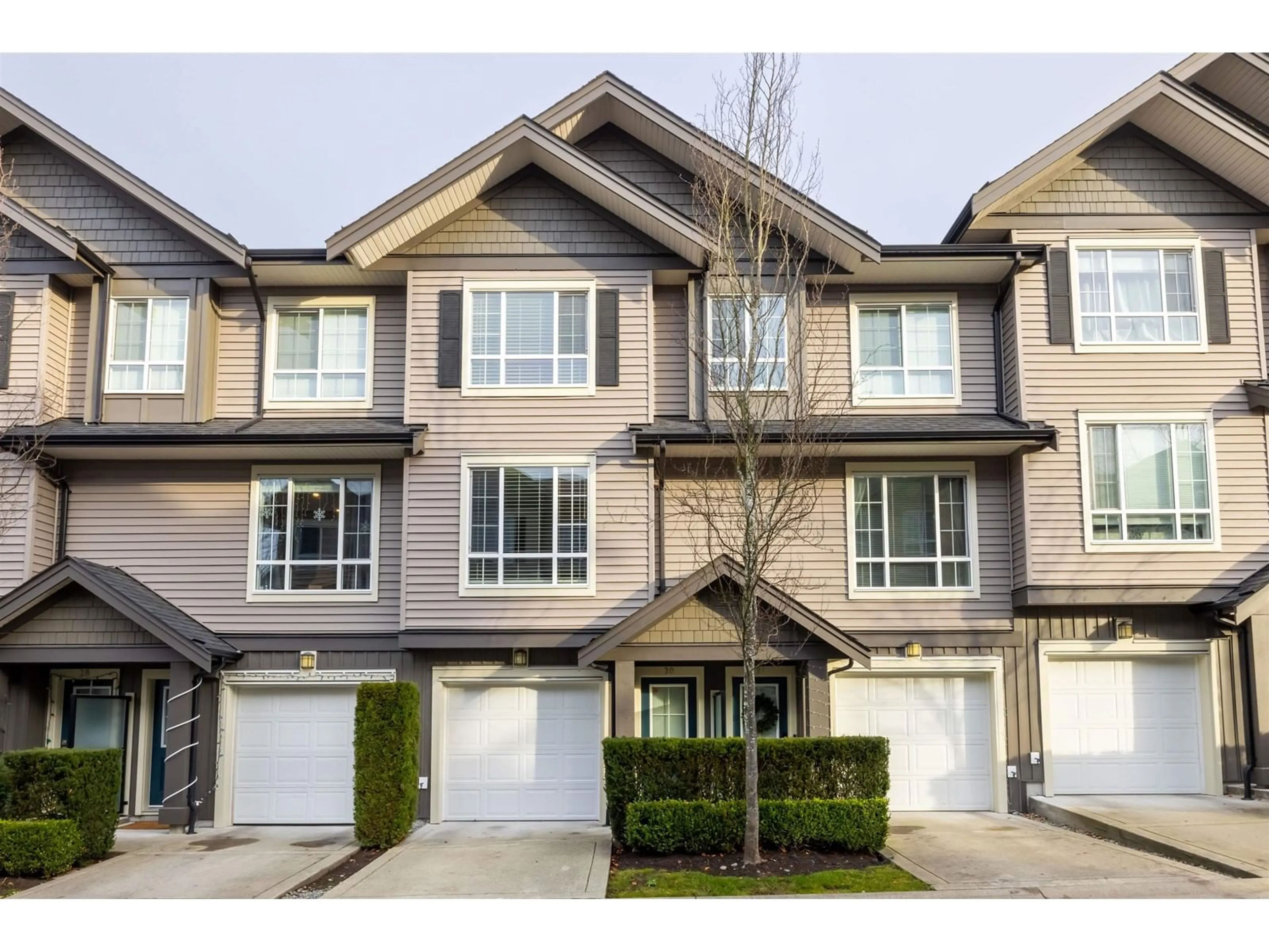 Home with vinyl exterior material, street for 30 4967 220 STREET, Langley British Columbia V3A0G3