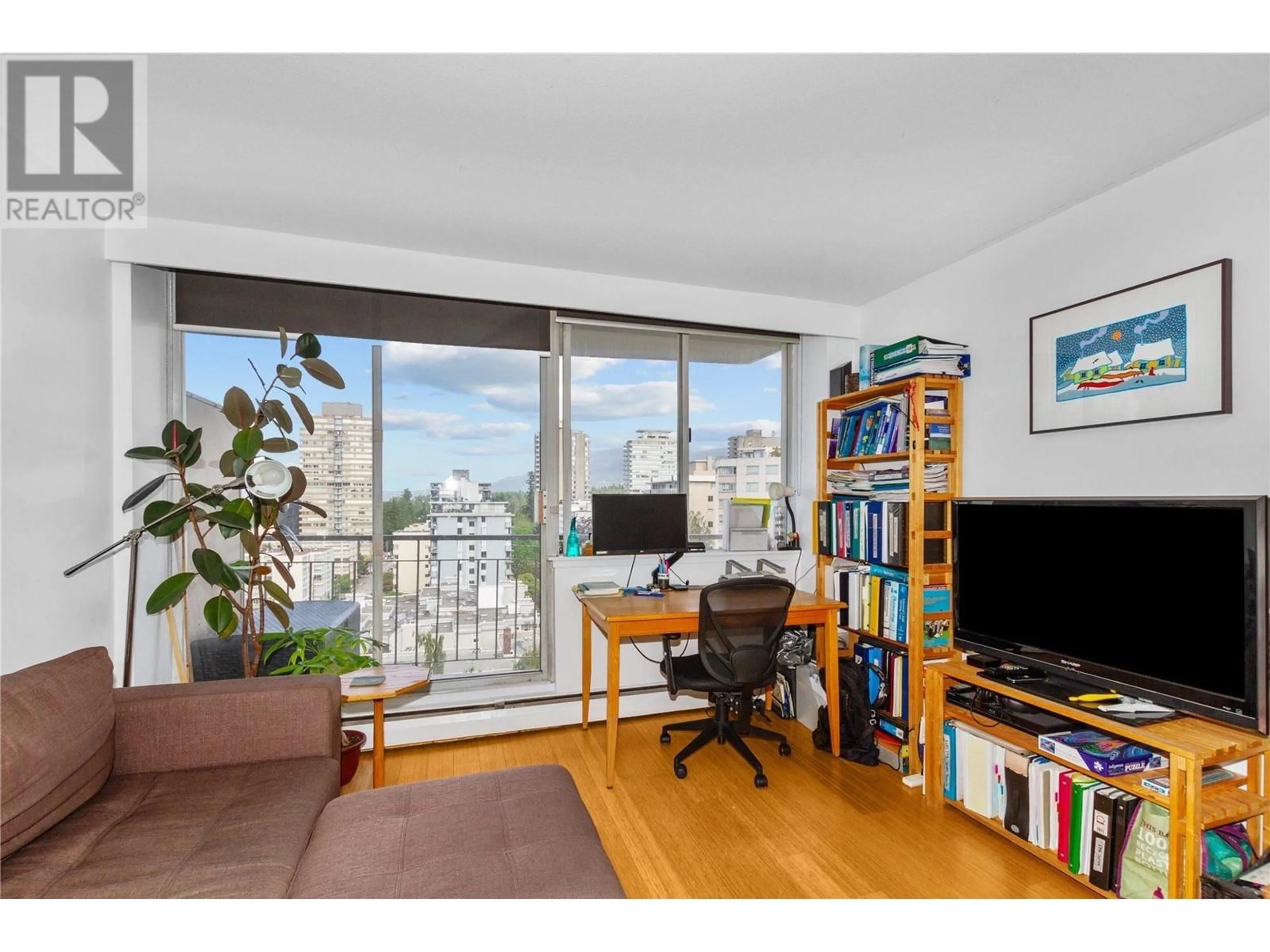 Living room with furniture, wood/laminate floor for 1205 - 1850 COMOX STREET, Vancouver British Columbia V6G1R3